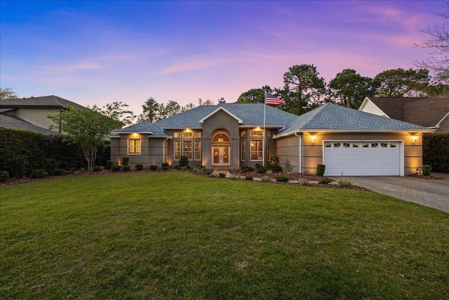 Welcome to this immaculately maintained POOL home featuring 3 bedrooms, 2 bathrooms, PLUS AN OFFICE! Nestled in Southwind, a gated community within Bluewater Bay.Remarkable outdoor living space, complete with a screened-in lanai, expansive covered patio, and sparkling pool enveloped by serene views of the GOLF COURSE and tranquil LAKE.Inside you'll find soaring ceilings, and built-ins throughout the home. Spacious living room, formal dining room, and private OFFICE. Eat-in kitchen with ample cabinetry, white appliance package with gas range, and breakfast bar. Off the kitchen you'll find the FAMILY ROOM featuring a cozy fireplace. Private primary suite with his and hers walk-in closets. En-suite bathroom with dual vanities, relaxing soaking tub, and separate shower. Split bedroom floor plan offers two additional bedrooms and a full bath. 
This beautiful home comes complete with an oversized 2-car garage with side entry for golf cart or additional storage. Custom exterior lighting that is able to be controlled by an app on your phone!