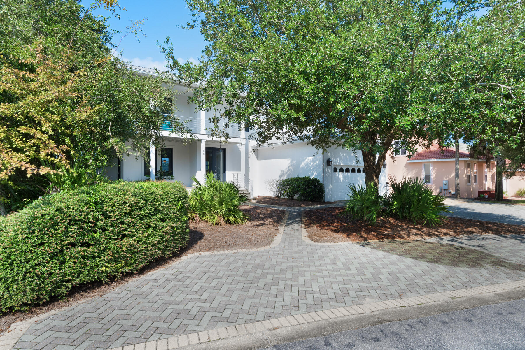 Enjoy pristine views of Eastern Lake and the Gulf from this waterfront residence in the gated community of Lakewood Pointe Estates. Perfectly positioned on the east side of the lake, this luxurious 2 story residence affords stunning views from every room. Enjoy waterfront living at it's finest with your own dock with boat lift. Go to the beach in style as you cruise across one of 30A's most popular coastal dune lakes to the beach access just to the south. Beautifully maintained home with open floorpan kitchen/living area on the main level coupled with a downstairs bedroom, bath, and garage. Upstairs contains the huge master suite, featuring an abundance of windows to absorb the views of the lake and gulf. The home has an plethora of covered porches on both sides of the home to enjoy the