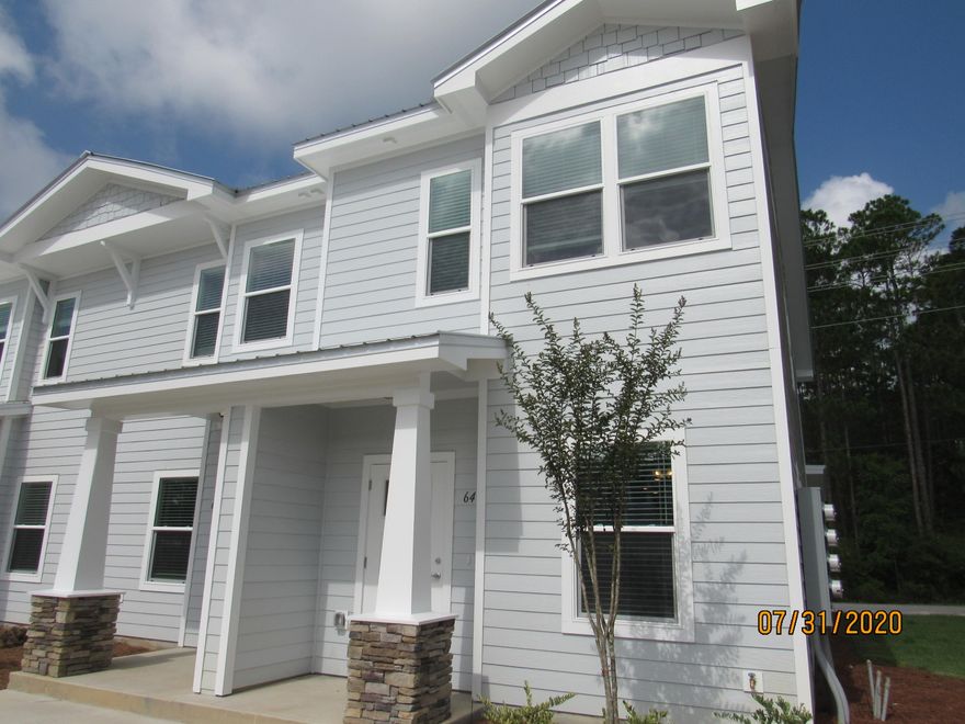 BRAND NEW, never lived in, 3 bedroom, 2.5 bath end unit town home with upgrades and a community pool! This lovely home is across the street from an elementary school, just down the road from a Publix shopping center, and a short, easy commute to the sugar sand beaches and emerald waters of 30a/SOWAL. It has fresh, neutral paint and no carpet throughout. The open floor plan on the first level includes a nice size living room with nook, eat-in kitchen with breakfast bar, gorgeous counter tops, plenty of counter/cabinet space, stainless appliances (including a flat cook top stove), and a beautiful back splash, as well as a half guest bath with pedestal sink and a screened-in back porch. Upstairs, you will find the master bedroom, complete with an en suite, as well as two guest rooms sharing a full guest bath and the laundry hookups (washer and dryer included in rental). There is plenty of storage. Pool care, lawn care, and garbage included in the rent. Pets may be considered on a case-by-case basis with prior owner approval and a non-refundable pet fee. NO SMOKING.