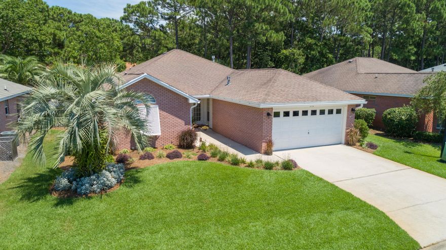 Spacious one level home located in the sought after Bayside community at the end of a Cul-de-Sac.   Open Living & Dining area has vaulted ceilings, gas fireplace, and beautiful  updated vinyl flooring throughout.  Master suite with ensuite bath and large walk in closet.  Two additional guest rooms with an additional guest bath. Kitchen is light and bright with granite countertops and newly updated stainless refrigerator with breakfast bar and informal dining area. Relax in the Large screened in Florida room with access to the living and Master suite. HVAC replaced 2017. Private fenced in backyard, with newly installed landscaping. Bayside features a community pool, tennis courts and playground area., as well as access to private dock on the bay.