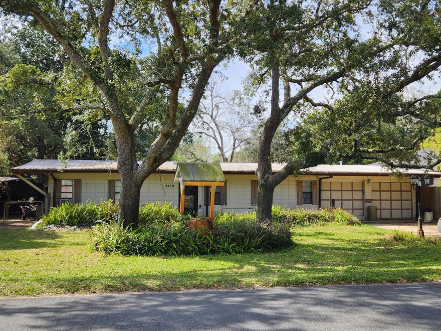 Calling for investors! One minute from beach, shopping centers, and restaurants. 3 bedrooms and 2 bathrooms with updated kitchen cabinets although need repairs inside. Roof 2008, No knowledge of electrical wiring. AC wall units in place. Cash offer only.