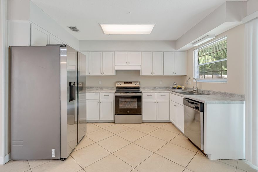 This house says,  ''RETIRE to Sunny Florida'' and  ''MAKE ME your FIRST HOME''. Perfect size home with 3 bedrooms and 2 baths, an open kitchen and good size living room and dining area. A nice covered patio takes you outside where you will find a storage shed for tools and fenced back yard. The central location could not be better, with easy access to schools, dining, medical facilities and both Eglin AFB and Hurlburt Field. PLUS the beach and Gulf of America about 15 minutes drive.  NEW SPARKLING STAINLESS APPLIANCES and KITCHEN MAKE-OVER 2025. ROOF and HVAC replaced 2021, bathroom shower tub resurfaced 2021, sprinkler pump new 2019, fence replaced 2019, some fresh paint 2024 and new garage door 2023; less maintenance for a new buyer. The access to the garage was recently closed off and could easily be opened again - maybe a porch built on the front or a new laundry room on the back patio. The washer and dryer are not warranted and remain for convenience for a buyer. There is a quote for a stackable washer and dryer in the house if a buyer wishes to install in the future.  Please note the date of the quote and when it expires.