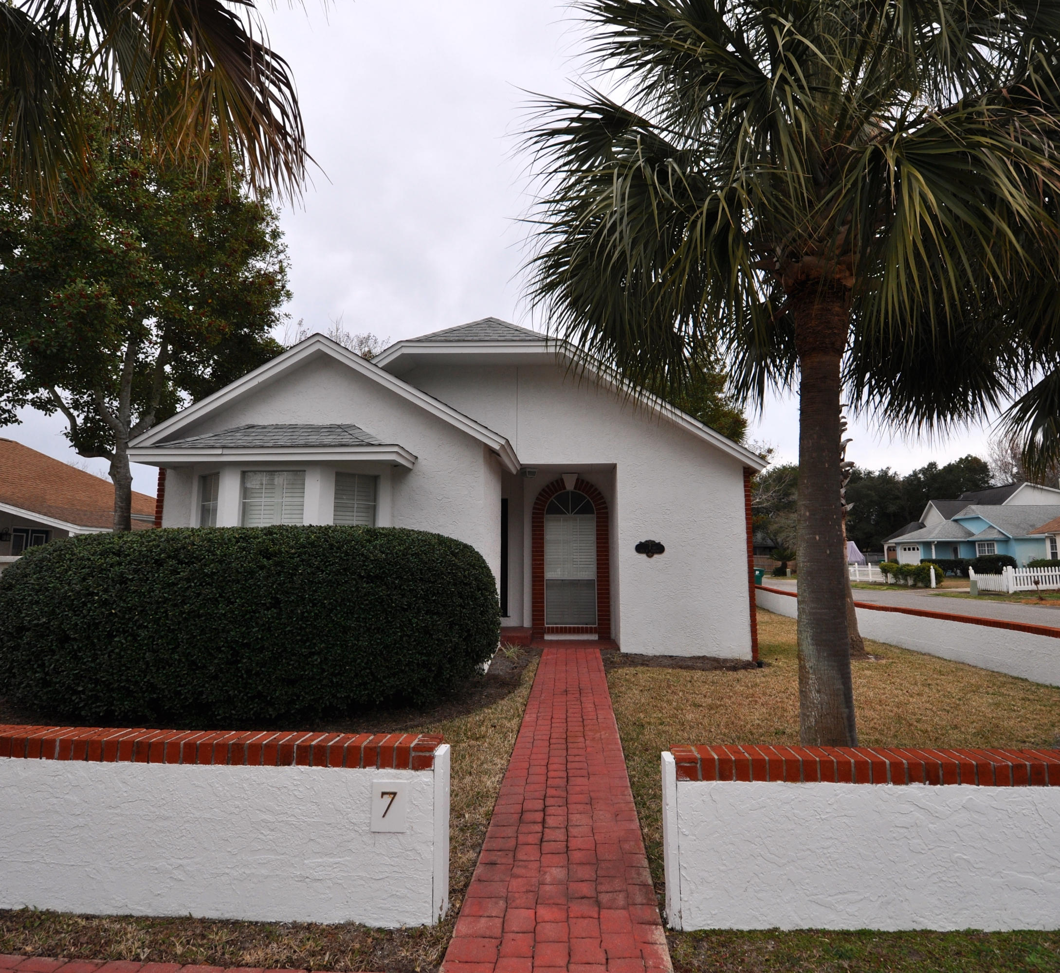 Exceptional opportunity in Destin for under 200,000 with a pool. Stainless steel appliances, granite countertops, plantation shutters and wood floors. French doors open up to the pool and upgraded master bath with vessel sinks - this home has been well cared for and won't last long. Nice corner lot, fenced in yard, mature landscaping. Outside covered storage area. Easy to maintain home - easy to view, Great vacation home!