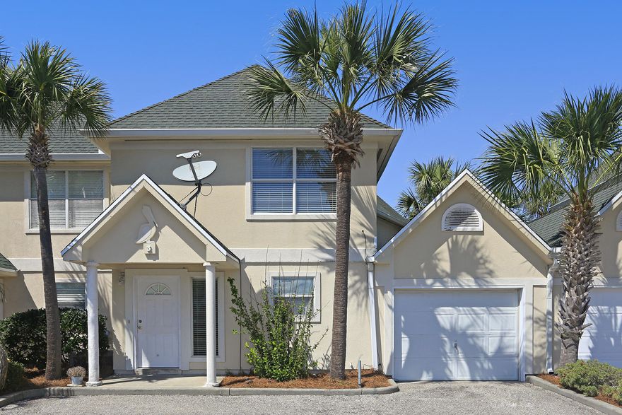 Location! Location! Location! AFFORDABLE townhome in the heart of Destin. Walk to Harbor Village Restaurants and activities. Spacious living area with sunken den and mirrored wet bar. Large Master bedroom with vaulted ceilings and roomy walk-in closet. Nicely sized 2nd bedroom with a private full bath. Full size laundry area on 2nd level. Kitchen is open and bright with plenty of cabinets, pantry, range, and dishwasher. Outside private patio. Attached single car garage with additional (pull-down) attic storage. Just steps away to the sparkling pool. Requires updates. SOLD 'AS IS'. Buyer to verify all data and specifications important to them.