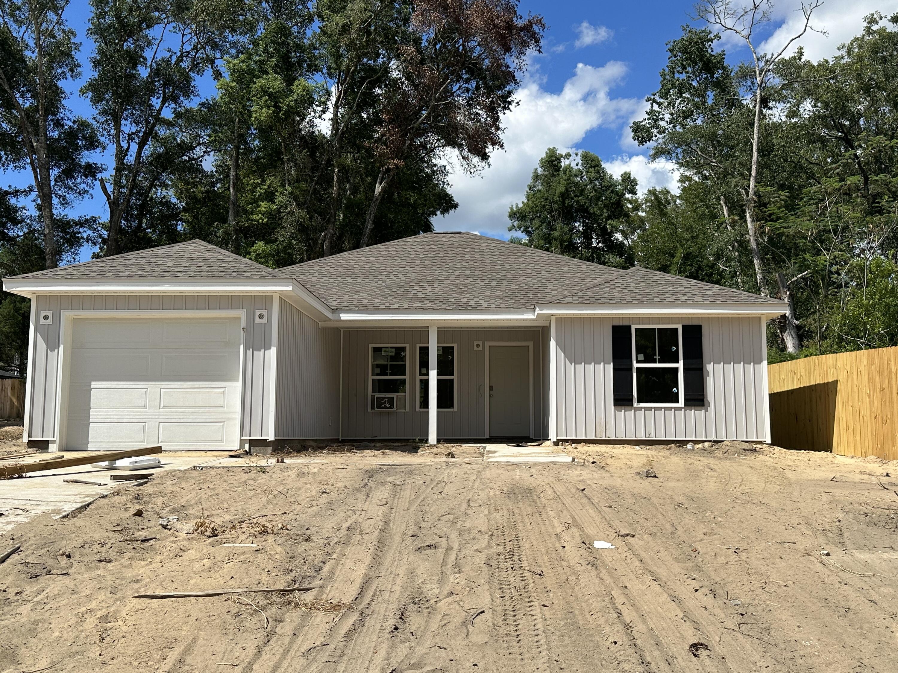 NEW CONSTRUCTION!!! Almost Complete! This home should be done by October 1! Come settle down in your new home! Kitchen features White shaker door style, complimenting the Quartz countertops and Stainless steel appliances!! Carpeted bedrooms!. Easy access to Hwy 331, Hwy 90 and I-10 giving endless options for local entertainment ,various beaches, military bases, grocery stores, Walton County Schools and much more!