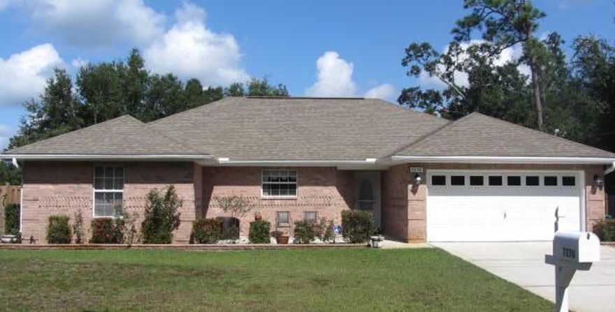 HIGHEST & BEST due by TUESDAY 3/22 by 5pm.  Don't miss out on this beautiful 4 bedroom 2 bath home! Upon entering, note the tile border at the front door and throughout the living, dining, and kitchen areas. Open concept with 10' ceilings. Large open living room/kitchen with a french door leading to the huge backyard! The kitchen boasts an abundance of cabinet space and counter space for food preparation with built-in microwave, a dishwasher and refrigerator with ice/water dispenser.The split bedroom design has the master on one side with the remaining 3 bedrooms on the other. Master has dual sinks with a large garden tub, separate shower and large walk-in master closet. This home is on a dead end road and 5 minutes from Navarre Beach! Come take a look! (Updated Photos coming)