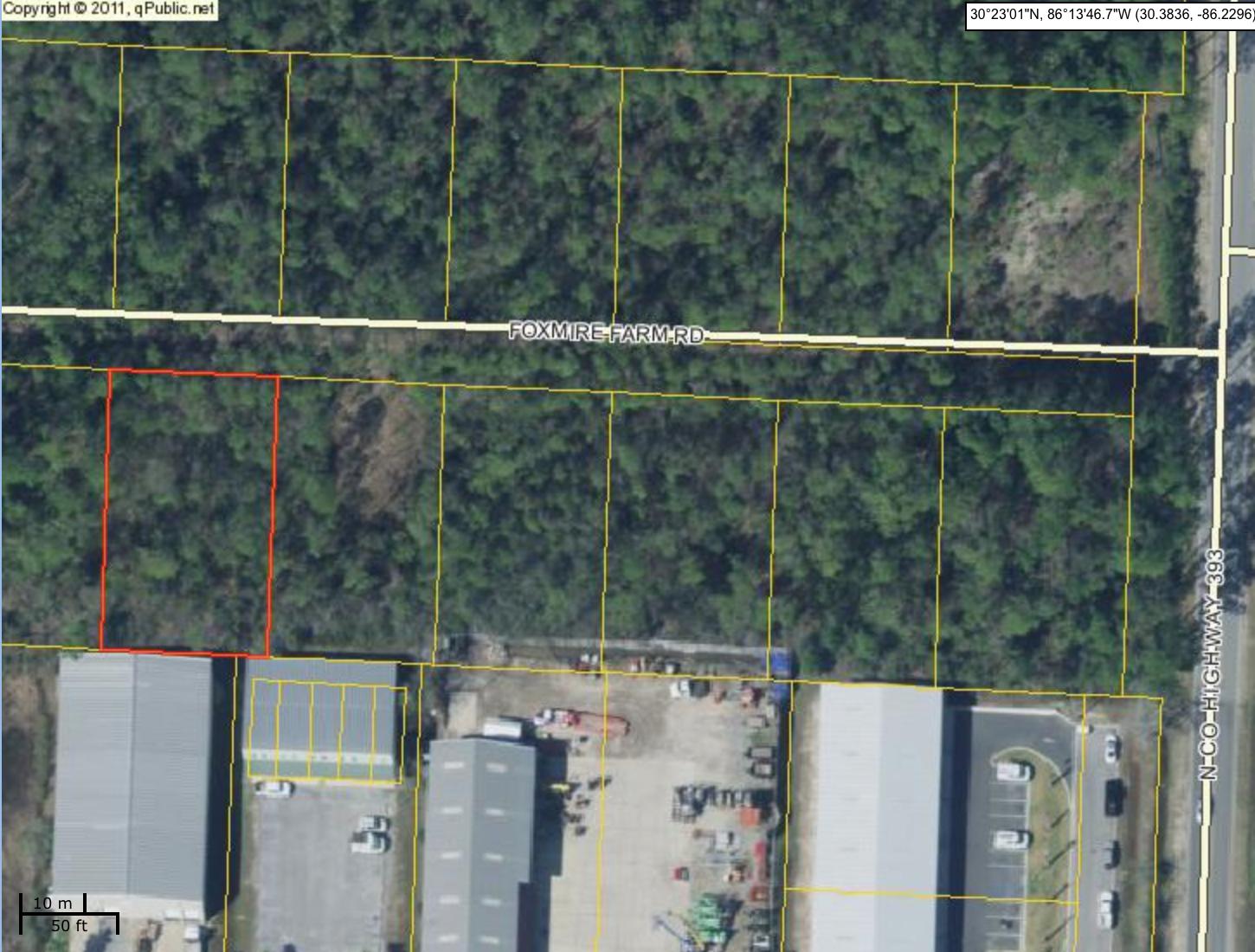 Lot is approx. 90'x135' all wooded. Road is an unimproved one lane dirt road. Some wetlands may be on property, buyer to do own due diligence. sign on lot