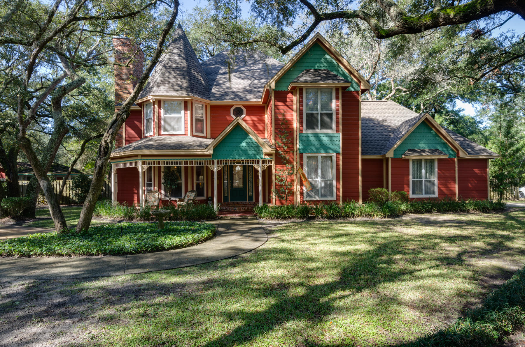 Two homes for the price of one.(Combined sqft 3872) Situated on a peaceful corner lot, this one-of-a-kind custom built Victorian estate and 1200 sqft detached guest house sits on almost 1-acre accented by majestic oaks. Nestled across the street from the Choctawhatchee Bay, this home has just undergone a refresh featuring new custom front and backdoors. As of this past month new roof and 10 new windows. The interior features tongue and groove oak floors in the foyer and the dining room, brick floors in the kitchen, nook, and sunroom, and tile in the upstairs baths. There is crown molding throughout the house. The great room hosts one of two gas burning fireplaces imported from Europe,the other is located in the master bedroom. This home also features a spacious kitchen with Corian counte