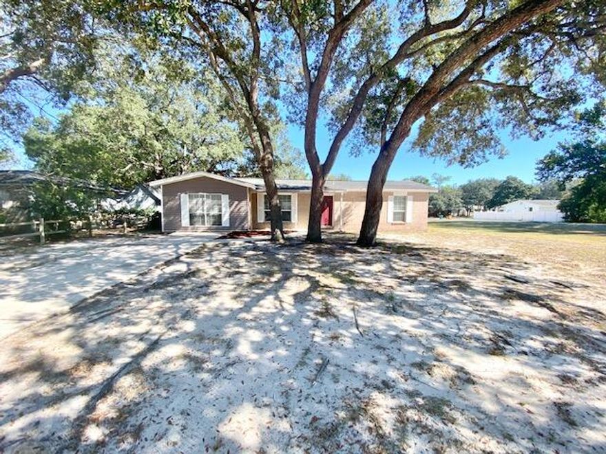 3 bedroom + bonus room! Eat in kitchen has all appliances in place. One car garage has been turned into a bonus room, it is heated/cooled/insulated. All rooms have ceiling fans. Split bedroom plan for extra privacy. All electric! Open back patio great for relaxing/entertaining. Fenced backyard great for pets/kids. Large corner lot. Close to bases, schools & shopping. Welcome home! 2019 Rheem Water Heater/2012 Trane HVAC/2005 Roof. Cheapest 3 bedroom in all of Shalimar by over $35K as of 11/14/22 per the MLS, priced to sell!