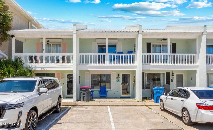 Directly across the street from the sugar-white sands of Panama City Beach, this updated Riviera Beach townhome delivers coastal convenience, investment potential, and beachside charm. Enjoy breathtaking Gulf views from the second-floor balcony and easy public beach access just steps from your front door. Inside, the home features tile flooring throughout the first floor and a spacious layout designed for comfort and low-maintenance living. The upstairs features carpeting in the bedrooms. The kitchen is equipped with granite countertops and a full appliance package, making it ideal for full-time residents or vacation rentals alike. The property is being sold turnkey--fully furnished and ready to enjoy or rent--just bring your own linens. Recent upgrades include new backyard landscaping for enhanced privacy and outdoor enjoyment, and a major utility improvementthis property is now connected to public sewer and water, offering peace of mind for future maintenance and rental value. Located on the desirable west end of the beach, you're just minutes from local favorites like Pier Park, Carillon Beach, and the 30A corridor. Dining, shopping, and entertainment options abound, making this a prime short-term rental opportunity or second home. With no HOA fees, two parking spaces, and a welcoming local community known for festive gatherings and golf cart parades, this is the ideal place to embrace the coastal lifestyle or expand your rental portfolio.