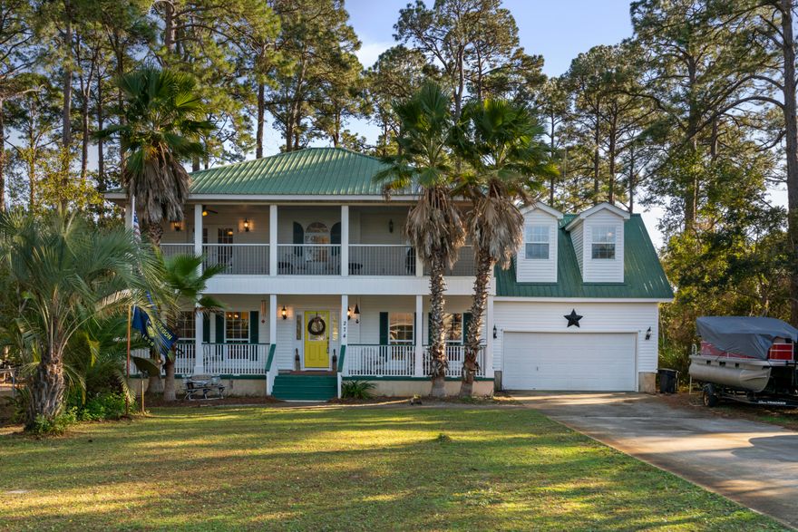 This well built and well maintained Southern Plantation home is charming and has beautiful solid hardwood floors throughout. The quiet neighborhood boasts nature and salt breezes as you saunter down to the end of the circle to dip your feet into the bay as this lovely home is located in between two boat launches on opposite sides of the street, which makes it perfect for boat enthusiasts, paddle boarders, and kayakers too. The vast front yard is great for entertaining or you can sit back, relax, and sip sweet tea on many of the porches and bask in the sun. The extremely large backyard has plenty of room for a pool! The beaches and all of what 30-A, Sandestin, and Miramar Beach has to offer are minutes away. Only 3.3 miles from hospital.