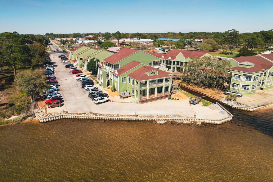 Consider this beautifully appointed 2,000 SF office space in Paradise Village Professional Park, Fort Walton Beach. Located on the third floor, this suite offers elevated views overlooking the interior greenspace and toward Santa Rosa Sound, with several offices having balcony access. The layout includes a versatile mix of private offices, open work areas, break room, and three restrooms, making it ideal for a wide range of professional uses. Paradise Village fronts Highway 98, with ample onsite parking, and is home to a strong tenant mix including healthcare, financial, real estate, spa, and defense-related businesses, and is strategically positioned just 5 miles from Hurlburt Field, 9 miles from Eglin AFB, and 11 miles from Destin-Fort Walton Beach Airport (VPS), this location offers both accessibility and prestige.

