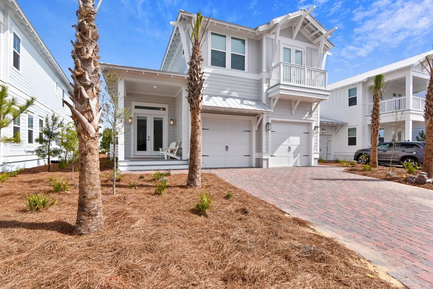 EASY TO SHOW! This gorgeous, professionally decorated, immaculate home is turn key ready and has everything you've dreamed of in a beach house! This home comes fully furnished and has the features you demand! Hardwood flooring throughout and tile flooring in the wet areas, 8' doors, smooth finish ceilings and walls, ceilings fans, and surface mount LED lighting. The chef inspired kitchen has maple door cabinetry with soft close doors and under cabinet lighting, built in gas cooktop, single wall convection oven and dishwasher with hidden controls. The countertops are granite with backsplash and stainless double sink, brushed nickel pot filler, Moen faucets and wood shelving throughout. The luxurious bathrooms feature granite throughout and brushed nickel Moen faucets.