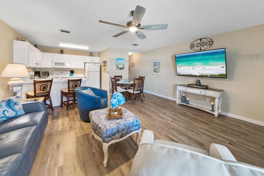 UPDATED & BEAUTIFUL! FABULOUS PRICE 1BR/1BA CONDO on west end of PCB across the road from the SANDY WHITE BEACHES & EMERALD COASTLINE. Within 5 minutes to Pier Park shopping, entertainment & restaurants. Recent updates: LVP flooring, paint, decor, lamps, tv, bedroom suite, curtains, rugs, bedding & balcony furniture. AC (2020). Hot water heater (2019). Appliances (2018). Neutral paint & tastefully decorated. Private Balcony. Rental ready. King bed, full size bunk beds in hallway, sleeper sofa to accommodate 6 guests. Your own laundry room. Your own private balcony with a storage closet. Wendwood has a new roof 2022 & Freshly painted. It is a quiet complex with a large pool & shuffle board. By grocery stores, the best donuts around, easy access to the airport, 30A shopping and just an hour drive to Destin outlet malls. Don't miss out on your opportunity to own this Beautiful Beach Getaway!