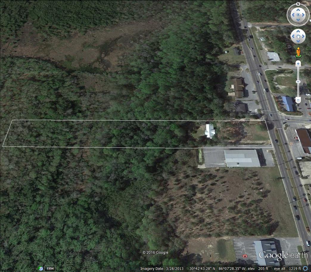 This wonderful large parcel is located on HWY 331 in the middle of town. What a great place for your business on this highly traveled major highway. There is already a solid structure on the property and could be renovated for a commercial space. The brick home was built in 1953 and has a newer metal roof. The property is located at a red light and has access from the opposite side of Bruce Avenue. If you are looking for a good large parcel for your business this is the perfect one and priced right.