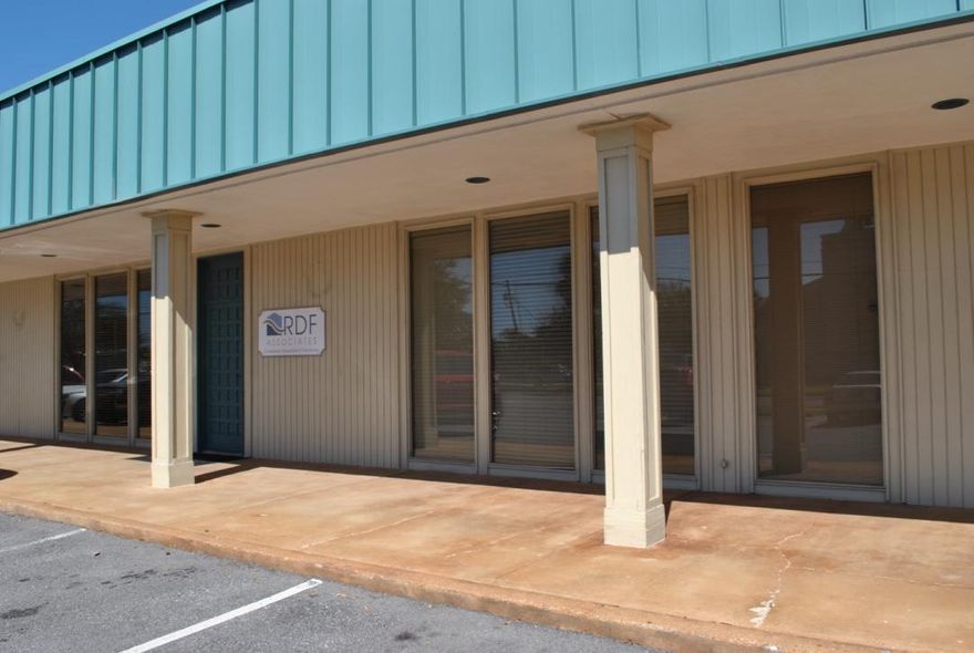 This listing is for two very well-maintainted units C&D at Liza Jackson Plaza (3050 sqft). They are both currently set up as an office space, but can be converted into retail. The space consists of a nice reception and waiting room area, a large and a small conference rooms, 7 offices, open area used for cubicles, a break room, two storage rooms, and two bathrooms. The units can be sold individually ($140,000) or together ($250,000). There is a monthly CAM fee of $270 per unit. Plenty of parking in front and in the back of the building.