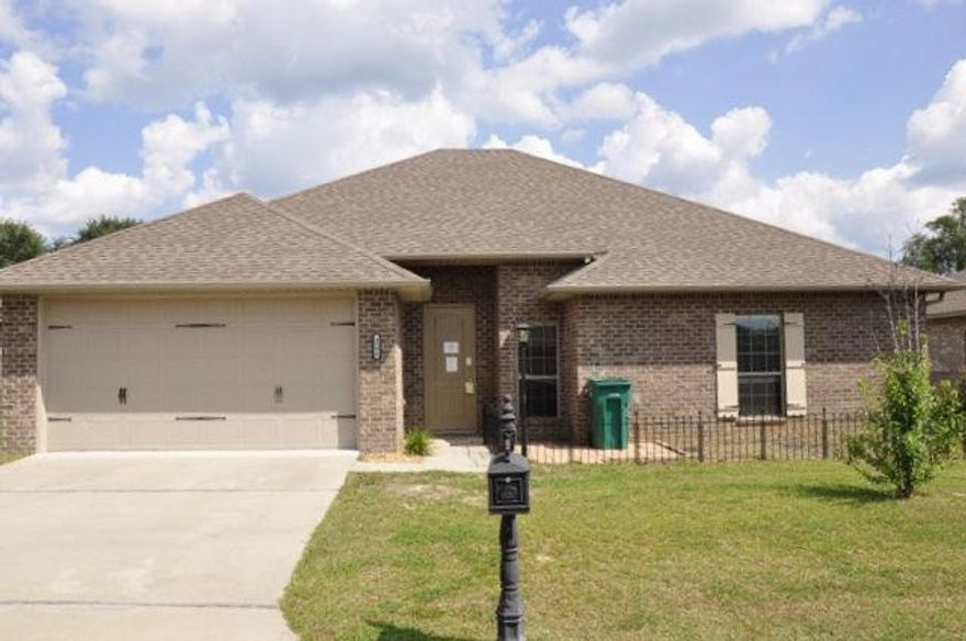REO. Lovely home located south of I-10 within the desirable Duggan Pond Estates subdivision! Many modern features can be found throughout this home including porcelain tile flooring in the main living areas, granite countertops, and light fixtures. The kitchen boasts a rounded kitchen island, pantry, and a convenient dining area. Enjoy the many benefits that the split bedroom floorplan has to offer, as well as the raised ceilings that make this home feel even larger than it is! The master bedroom provides a walk-in closet and the ensuite features a double vanity, walk-in shower, and a garden tub. In the backyard, entertain on the open patio that also features corrugated metal siding on the corner of the fence.