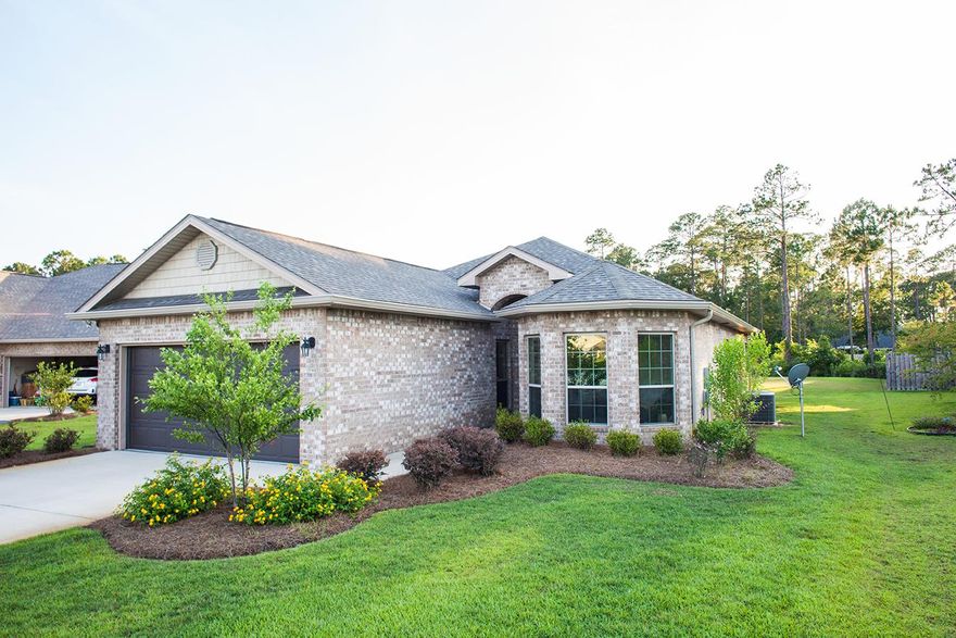 Sellers MOTIVATED to close by 9/1/16. Price reduced again! This beautiful & loved home sits on a very large lot with views of a lake in the front of the home & another lake in the back! The current owners selected this upgraded lot before the home was built approximately 2 years ago. Custom window treatments, light fixtures, granite counters, wood floors in the living/dining area, ceramic tile in the kitchen, foyer, bath & laundry. The exterior of the home features rain gutters, lawn sprinklers & a nice covered patio out back that has amazing views! The neighborhood has sidewalks, a clubhouse with pool, park/playground and benches! View an unbranded video from the Sellers here Vimeo.com/167881355 (case sensitive password to view is Real Estate) Schedule your private showing today!