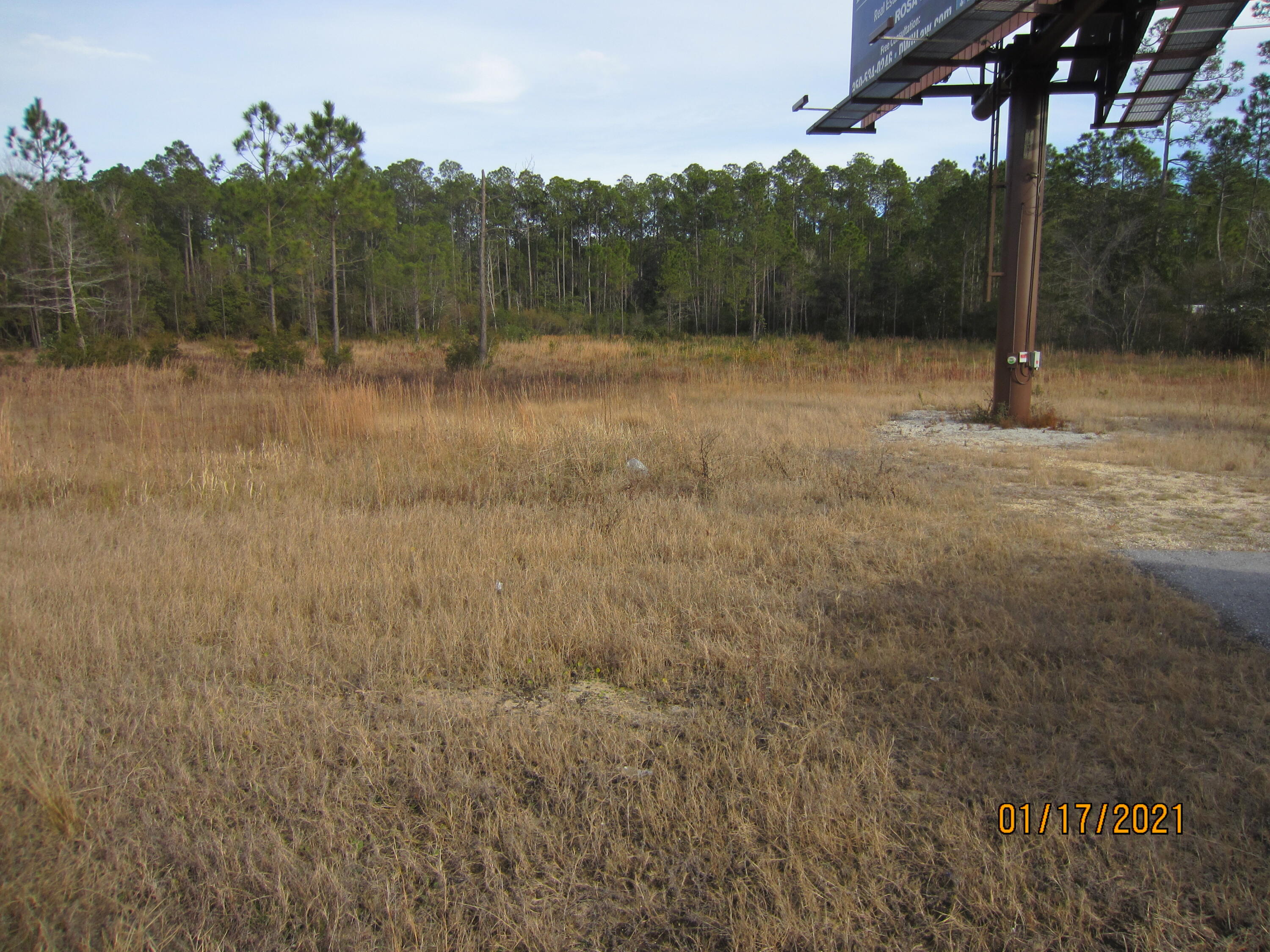 COMMERCIAL vacant land with 300 feet of frontage on Hwy 331.  Great visibility in a major conduit to the Beaches of South Walton and highway 98.  Public water/sewer can be extended from Ramsey Branch Road.  Approximately two (2) acres have been assessed as UPLANDS.  The billboard sign has been carved out and does not convey and is not owned by the Seller.