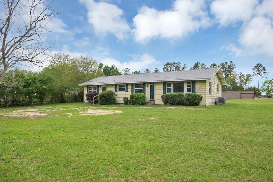 Are you read to have a little bit of space? No neighbors on top of you? Ready to grow your own garden? This 4/2 is situated on 1.33 acres* and located in one of the most desired areas with a short commute to I-10. You can move right in and if you choose, you can make some cosmetic improvements. There is new flooring in the kitchen and bath. The home has a large back porch, a large shed for your gardening tools. The property also has 2 septic tanks, one for the home and additional auxiliary one. And a concrete slab to put a pole barn on. The roof was replaced in 2021. This property's use code is MULTI-FAMILY. Land is the name of the game and here it is!