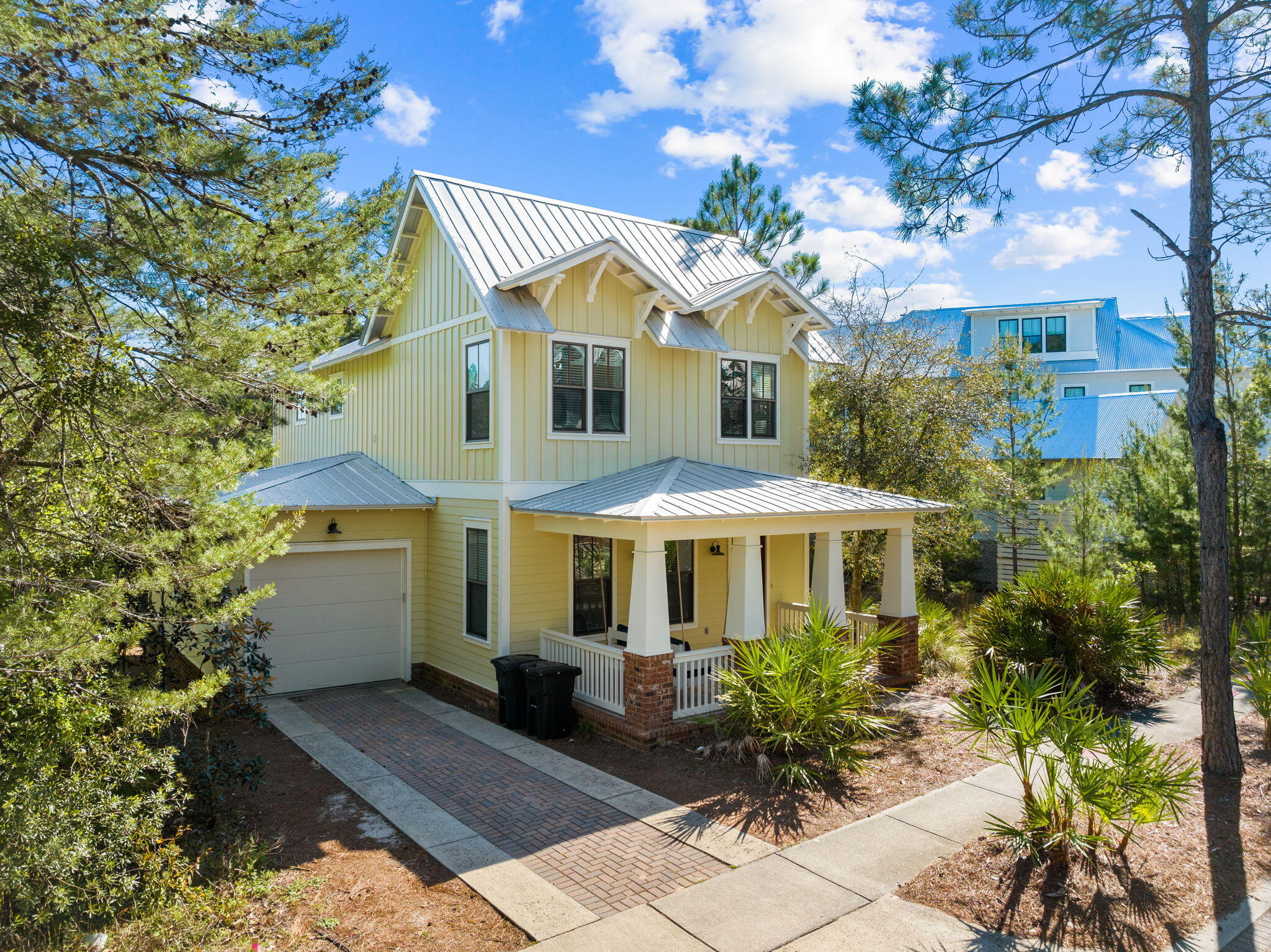 BRING AN OFFER! GORGEOUS LAKE VIEWS, FULLY FURNISHED WITH 6-SEATER GOLF CART INCLUDED WITH SALE - Nestled within the private, gated community of Forest Lakes located on 30A, this stunning home offers an exceptional blend of comfort, style, and natural beauty. With access to scenic walking trails, lush green space, a large community pool, and a covered outdoor pavilion, this residence provides the perfect balance of relaxation and recreation.At 24 Lanier Drive, step inside the entry foyer where your eyes immediately are drawn to the large back windows and French doors leading to the back porch overlooking the lake. But first, turning to the left you are greeted by the first-floor primary suite with a beautiful master bath featuring a floor-to-ceiling tiled shower and walk-in closet. Headed back into the invitingly open main living area, you'll find those large windows framing serene lake views and filling the space with natural light. The peaceful setting continues onto the back, screened-in patio where you can unwind while taking in the tranquil lake views. Back inside, you'll notice the beautifully designed kitchen which features stainless steel appliances, granite countertops, and a spacious island with a breakfast bar, making it ideal for both casual meals and entertaining.
Upstairs, a spacious landing currently serves as an additional living space, perfect for a media room or cozy lounge. The second level also features a dedicated laundry room, a charming bunk room, and a guest bedroom with a shared full bath.
The crown jewel of the upper level is the luxurious primary master suite, boasting breathtaking lake views, a generous walk-in closet with custom built-ins, and master bath complete with a double vanity and a floor-to-ceiling tiled walk-in shower with a built-in bench.
Whether enjoying peaceful mornings by the water, exploring the community's outdoor amenities, or gathering with friends and family in the beautifully designed living spaces, this lakefront home is a true sanctuary offering both elegance and comfort. The home is being sold fully furnished and includes a 6-seater golf cart.
Being located on 30A, you have easy access either by golf cart, bike, or walking, to nature trails, the beach, dining, shopping, and entertainment. Forest Lakes is only a short distance to places like Gulf Place, Shunk Gulley, Growler Garage, and so much more.