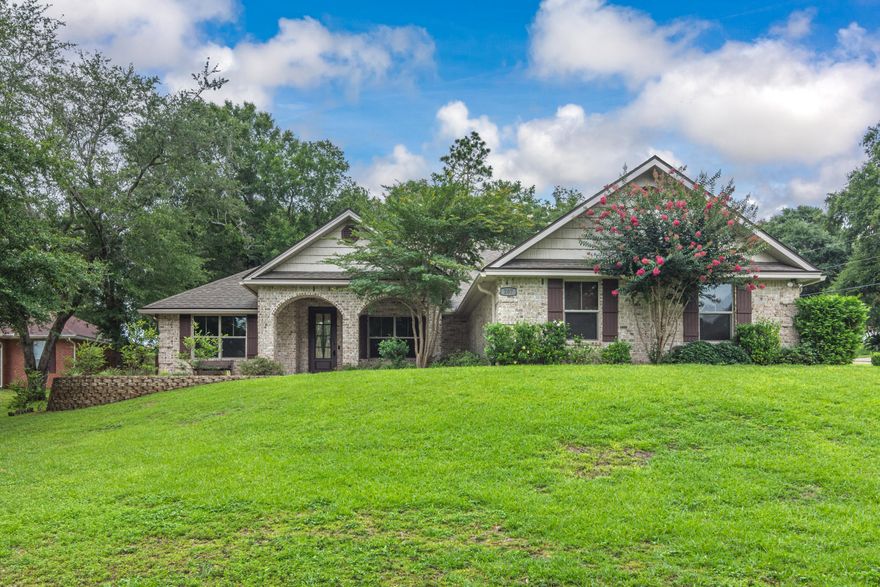 As you step through the entry way, you will fall in love with the high ceilings, crown molding, diagonal laid tile, recessed lighting and upgraded finishes throughout this home. The living area is an open floor plan and flows perfectly into the kitchen. Kitchen features granite counters, stainless steel appliances, glass top stove, large breakfast bar, and more! The bedrooms are a split plan with the master boasting decorative ledges, crown molding/trim, ceiling fan, shower with separate tub, double shower heads in the master shower, granite in bathrooms, double vanities and walk in closet that opens into a massive laundry room. Three additional bedrooms all feature carpet and ceiling fans.There is a bonus/office space off the main living area for all your flex needs.