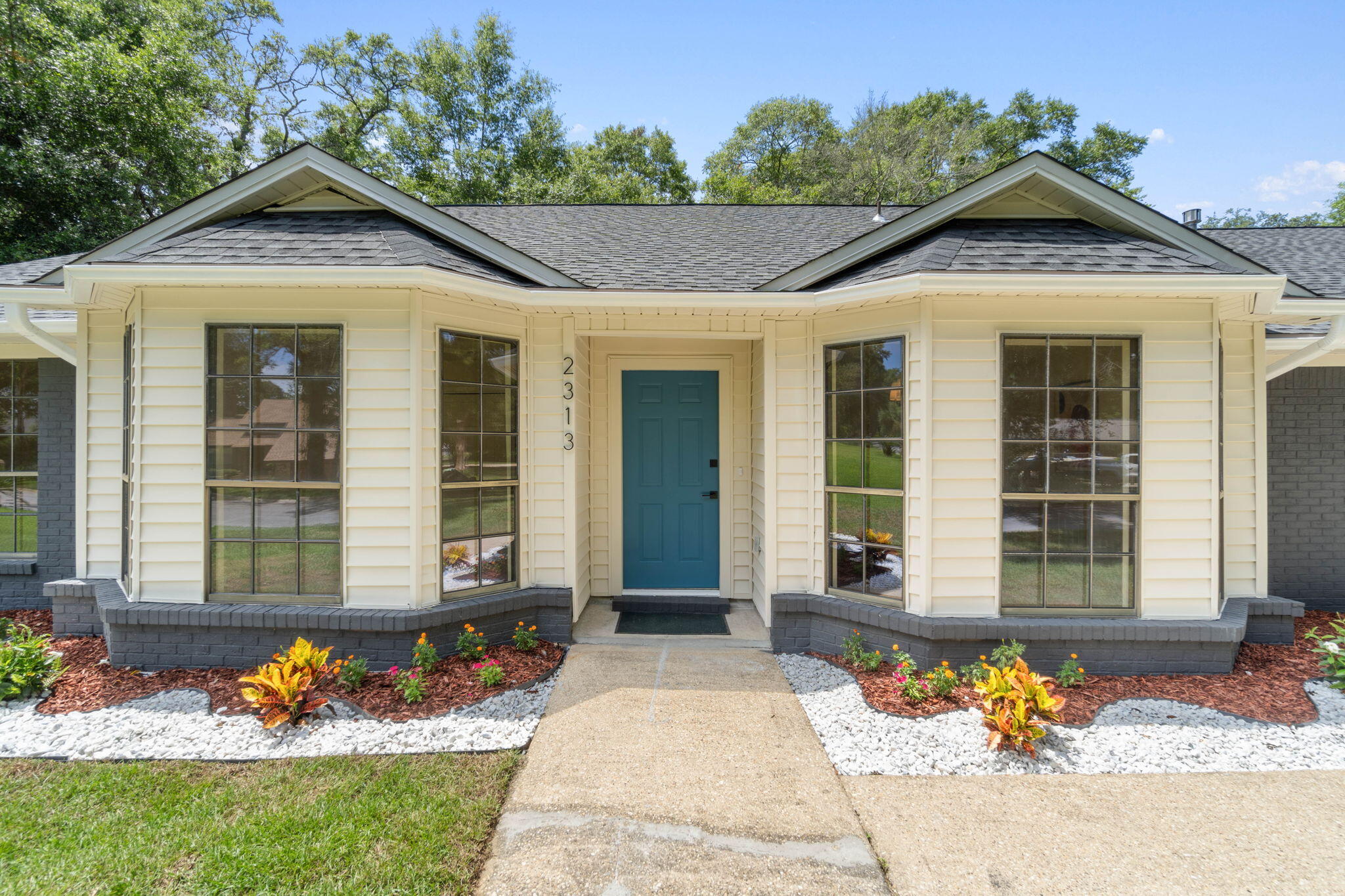 Welcome to your newly renovated residence in Edgewater Village in Niceville, where timeless charm offers a blend of classic appeal and contemporary convenience! Step into a world where every detail of this 2,200+ sq.ft. residence has been thoughtfully curated to create a haven located on 0.43 acres. The moment you step inside, you'll be captivated by the seamless blend of contemporary design and comfort.The open-concept living space is a showcase of style and functionality, with LVP floors and a cathedral ceiling adorned with a wood beam and multiple skylights that flood the room with natural light. The living room invites you to unwind by the wood burning fireplace, while the chef's kitchen is a culinary masterpiece.