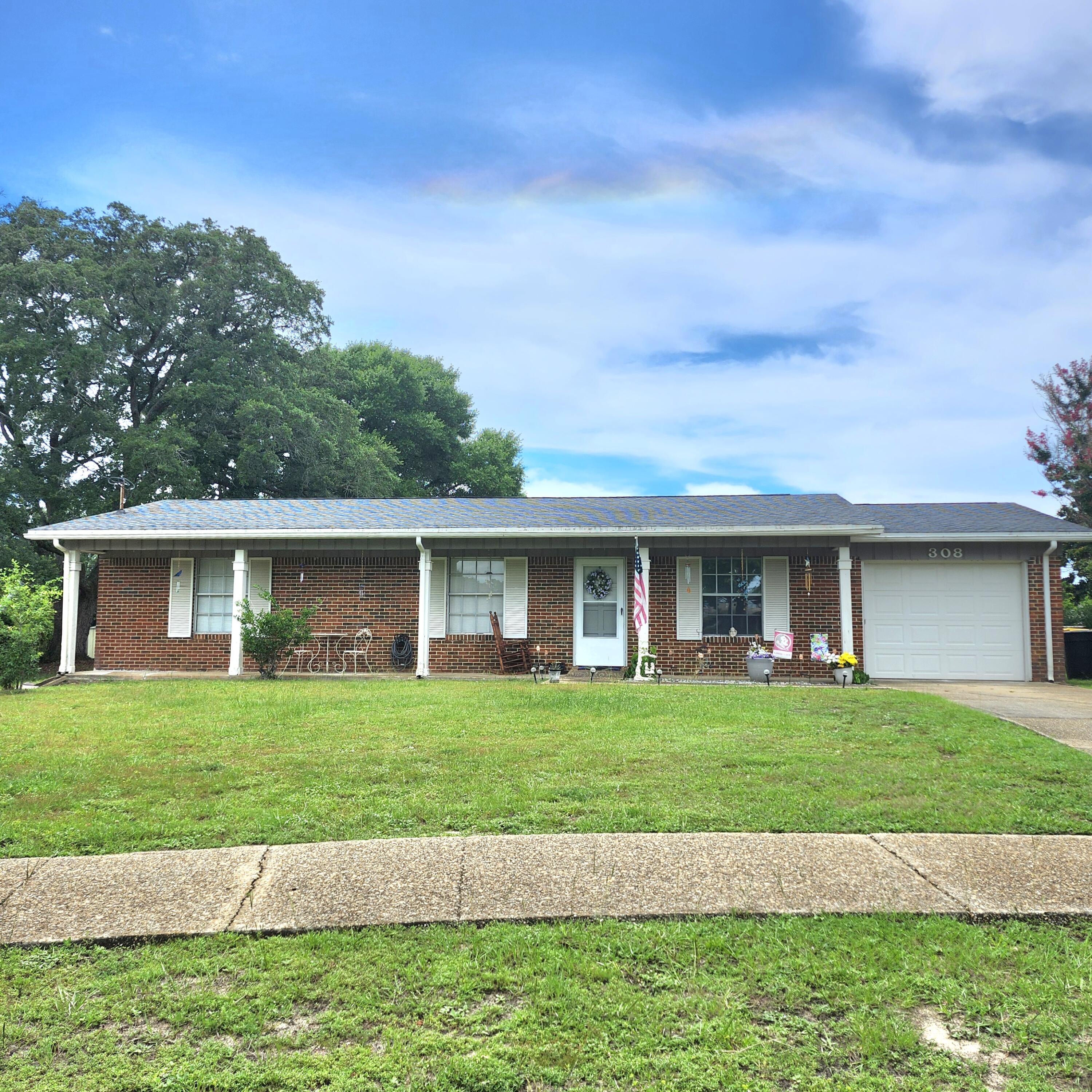 Cute mostly brick home conveniently located to Hurlburt, Eglin AFB and schools. It's a short drive to downtown which offers a waterfront park, playground, shopping and restaurants. Beautiful white sand beach on Okaloosa Island is minutes away. The floor plan offers formal dining, a living room plus a den. Nice entry porch runs the length of the house and a patio in the huge backyard are perfect for your outdoor enjoyment. There is plenty of room for a pool, outdoor sports and activities. Ceramic tile throughout the home is great for pet lovers and those who suffer with allergies. The kitchen cabinets have been updated, HVAC replaced in 2018 and hot water heater in 2025. The master bath has a walk-in shower for easy access. Ready for immediate occupancy and just waiting for you.