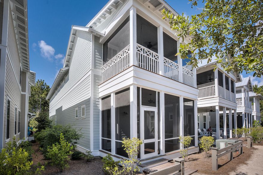 This beautiful 5 bedroom, 4.5 bath home is like new. This home features wood floors throughout, V-Groove wood walls, 10ft ceilings on the first floor, abundant windows, lovely kitchen with Caesarstone countertops, gas range, farmhouse sink, bar area with wine fridge & gorgeous light fixtures throughout. The home has 2 generous Master suites, one on the first floor and one on the second with private porch, a second floor media area with vaulted ceilings and built in bookcases, 2 additional large bedrooms and the 5th bedroom is a bunkroom with closet and built in drawers. This property also offers a whole home security system and water filtration system. This home has plenty of storage, with large pantry, closets & a golf cart garage.