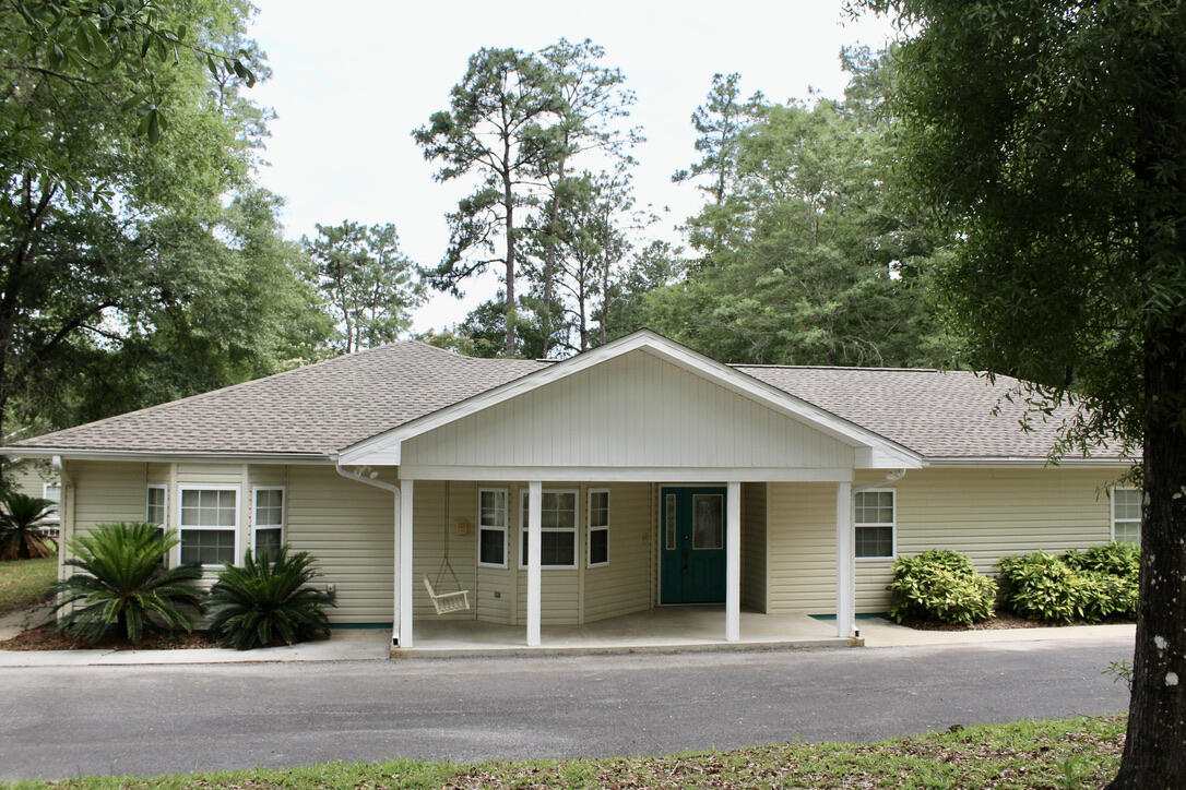 Here is one you will love!!! Attractive contemporary designed home in Country Manor, one of DeFuniak Springs nicest subdivisions. Well located. Easy access to all amenities. The home sits on two beautifully landscaped corner lots. Wonderful design. You will love the open living room, kitchen and dining room floor plan. You will love this custom design that includes an office. Bedroom # 3 could easily function as a 2nd office giving you a 'his and her' office combo. The home is in excellent condition, vacant and move in ready. Included is an attached two car garage, and a detached workshop. Easy to show.