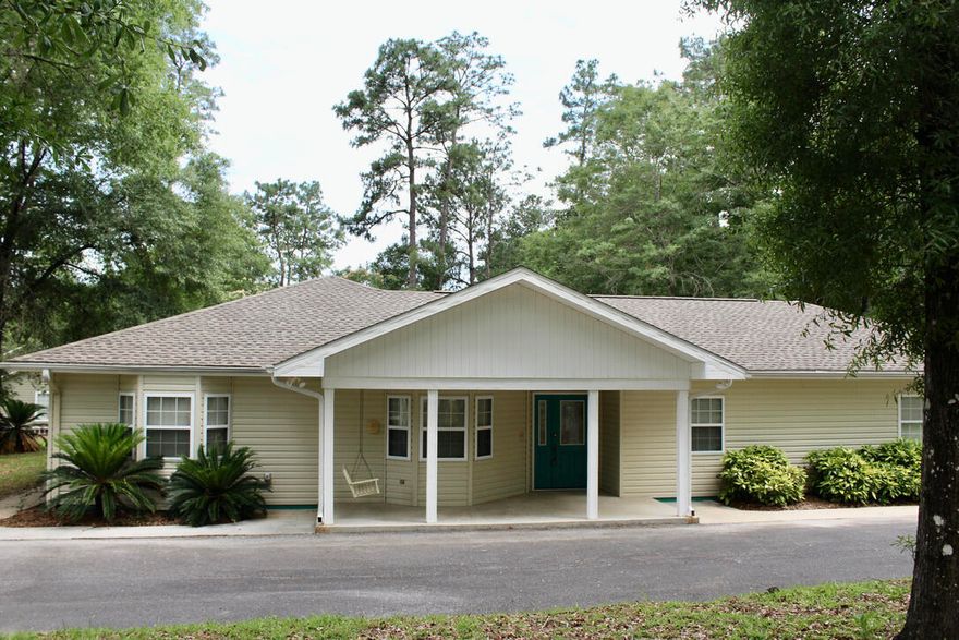 Here is one you will love!!! Attractive contemporary designed home in Country Manor, one of DeFuniak Springs nicest subdivisions.  Well located.  Easy access to all amenities.  The home sits on two beautifully landscaped corner lots.  Wonderful design.  You will love the open living room, kitchen and dining room floor plan.  You will love this custom design that includes an office.   Bedroom # 3 could easily function as a 2nd office giving you a 'his and her' office combo.  The home is in excellent condition, vacant and move in ready.  Included is an attached two car garage, and a detached workshop.  Easy to show.