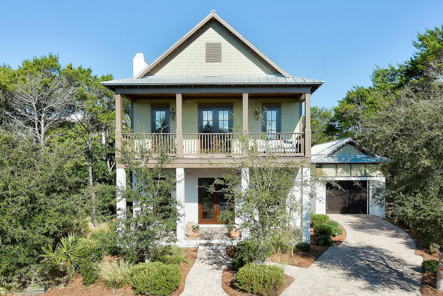 A talented architect and skilled builder brought to life this timeless home in Heritage Dunes, just over two miles east of Seaside, south of Scenic Highway 30A. The 30 owners in this intimate, gated neighborhood share 375 feet of dedicated beach front and beautiful pool. Care in construction can clearly be seen in this homes many finish details. Brick-clad porches lead into interior spaces that feature deep baseboards, custom millwork, moldings, and hardwood floors that carry throughout. A gas and wood-burning fireplace lends both warmth and charm to the spacious living room with wood beam ceiling.