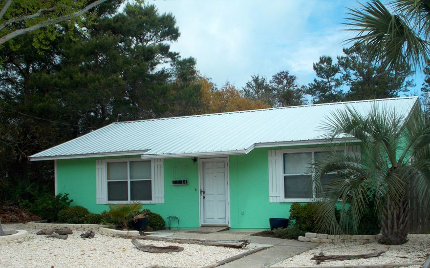 Sweet Beach Home. 2 Bedroom/ 2 Bath in the ''West End'' of Panama City Beach. This Home is only a few Blocks to the beach. It has a nice open floorplan with vaulted Ceilings, Breakfast Bar, large Living Room. The back yard is fenced, it has a storage building, a Laundry room and outside Shower. Riviera Beach is a Golf Cart friendly community. DON'T LET THIS ONE GET A WAY.
