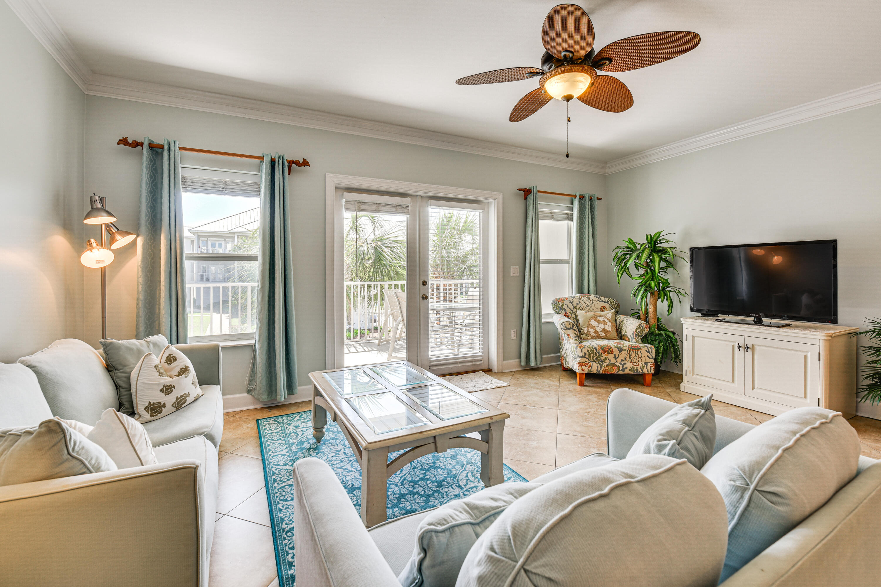 Welcome to Pavilion Palms - a gated, low-density community in the heart of Miramar Beach! This beautifully maintained 2-bedroom, 2-bath condo is sold fully furnished, making it completely move-in or rental-ready. Inside, you'll enjoy a spacious open layout and a large private balcony perfect for entertaining or relaxing. Just steps from a public beach access with a restaurant and restrooms, this location combines privacy with unbeatable convenience. The condo includes a rare two-car garage--perfect for vehicles, beach gear, or a golf cart for cruising along Scenic Gulf Drive. Plus, there's an additional exterior storage closet, ideal for keeping all your beach essentials neatly tucked away. Pavilion Palms features a sparkling community pool and beautifully landscaped grounds, all within a secure, gated environment. Whether you're looking for a primary residence, second home, or investment property, this condo offers the perfect blend of comfort, location, and lifestyle on the Emerald Coast.
