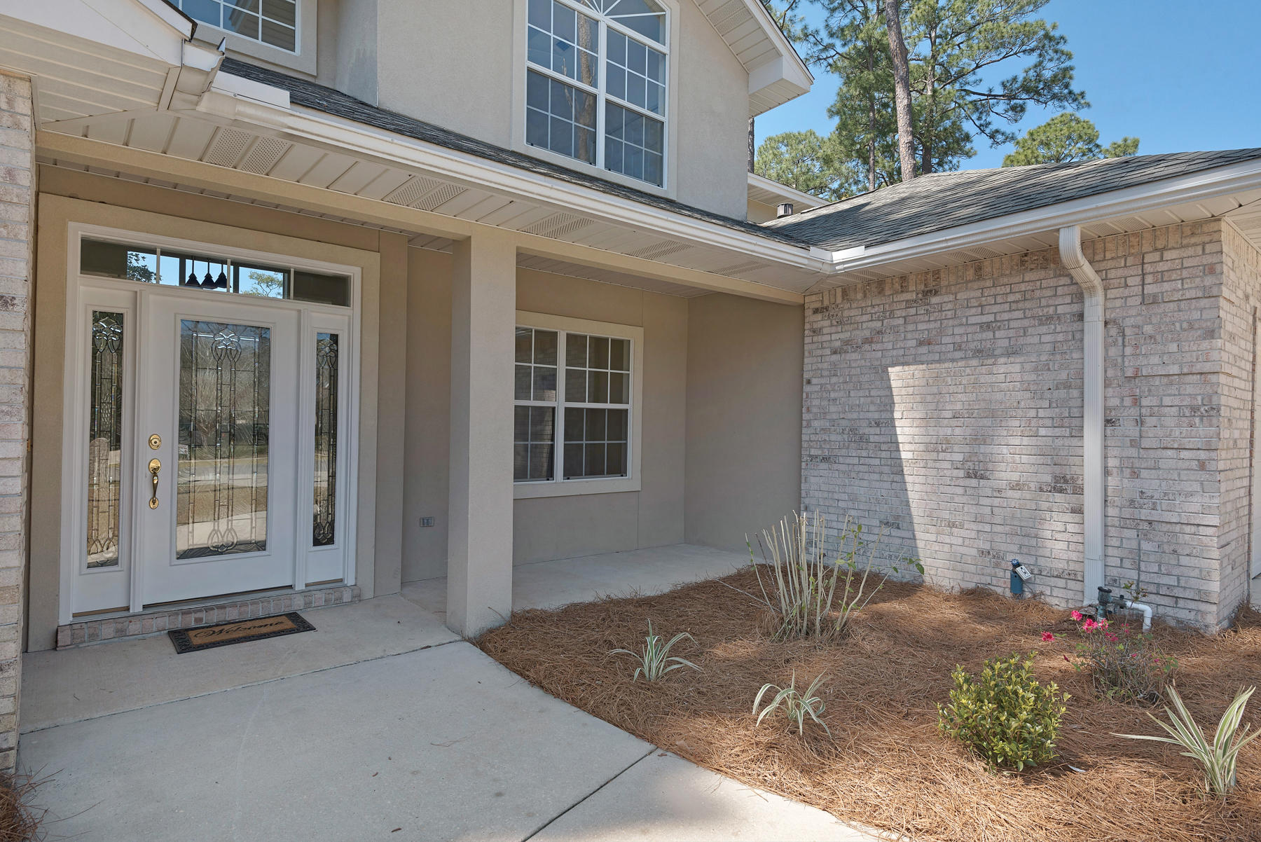 Quality Construction. Central location. Outstanding home. Built by Gary Miller in the sought-after subdivision of Bayshore Place. Located in the heart of Niceville within minutes to schools, bay-front park, shopping, dining and Eglin AFB. The foyer greets with 18' vaulted ceilings to the great room with gas fireplace surrounded by granite tiles and custom built in shelving. Dedicated office is to the right as you enter and formal dining room with bay window to your left. Expansive kitchen with granite counters, breakfast bar, gas cook top and designer tile backsplash. Open the giant sliders in the back to double your entertainment space and spill out to the 15x30 screen-in-patio/pool deck. Master bedroom is located on the first floor with ensuite bathroom with double vanities soaking tub,