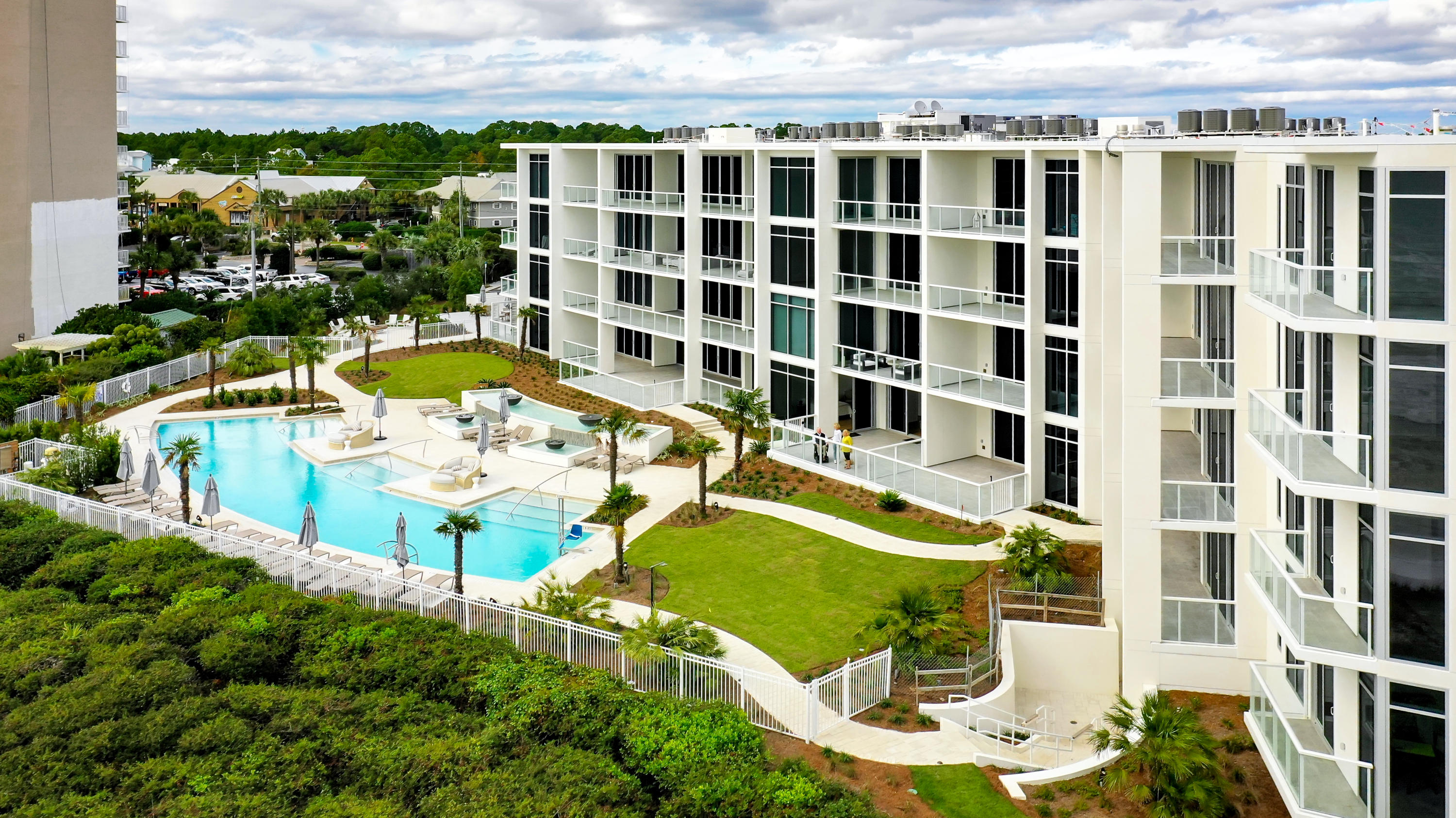 Modern Luxury Perfected - VILLA THREE. The Villas at Thirty-One, Exclusive estate size villa living in 30A's premier new address Thirty-One. An unprecedented expanse of 65 feet of floor to ceiling glass on the Gulf of Mexico will offer breathtaking, unobstructed views only afforded by a select few. Timeless classic materials set the stage for this rare opportunity of effortless, luxurious living. A multitude of finish selections are being offered to customize your residence for that custom home building experience. Custom features include 10 ft. ceilings, luxurious stone countertops, Wolf & SubZero Appliances, spacious laundry rooms with Full-size washer and dryer, folding table & sink wet bar with wine refrigerator & Ice Maker, frameless thick glass shower doors,