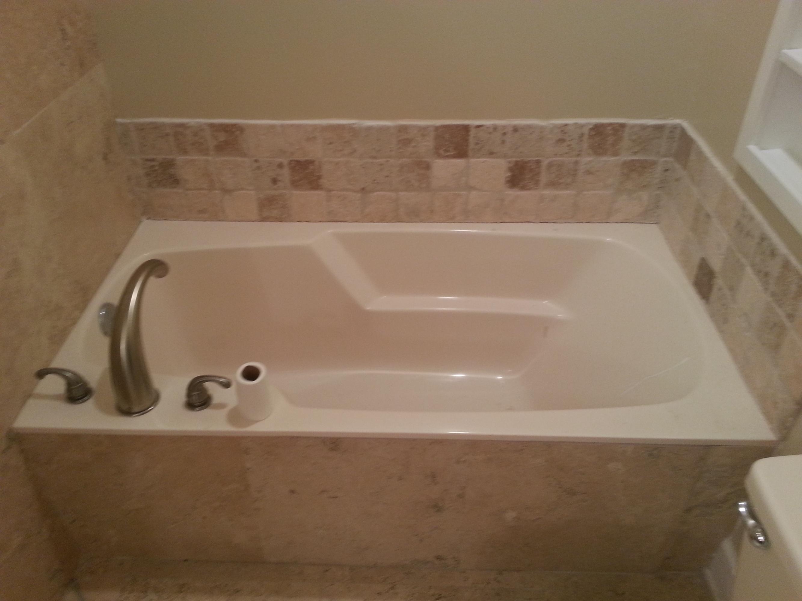 In sought-after Bluewater Bay, this three bedroom home has been updated and is ready for you! NEW carpet, new range and refrigerator; you will love the beautiful new tiled shower and tub in the master bathroom! The living room opens up to an additional space that is perfect for an office area, playroom, or extra sitting room. Exposed brick wall in the living room offers a warm touch with a wood burning fireplace. Tiled dining area is large enough to seat all your guests! Zoned for A+ schools and just a short drive to Eglin AFB or the beaches of Destin, call and schedule you showing today!