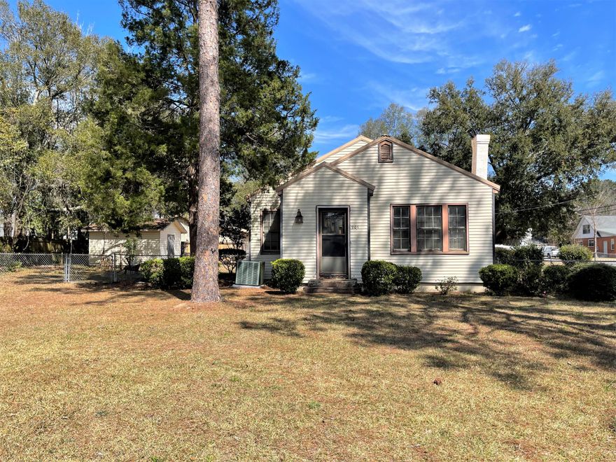 Great investment opportunity or income producing home.  This charmer sits on a large corner lot and can be used as your home or business. It has a 2 bedroom/1 bath main home with a 1 bedroom/1 bath apartment on the back of the property. (The apartment is currently rented for $700 a month and lease runs until the end of June) The main home is 1339 SF and has some beautiful hard wood flooring and a lot of original charm and character. A bonus room could be a 3rd bedroom but it does not have a closet. There's a lot of potential here for someone with some vision. The apartment has 600 SF and was recently renovated. Both have been good rentals and a good source of income. The home is within walking distance of restaurants and some grocery shopping. Property is being sold AS-IS.