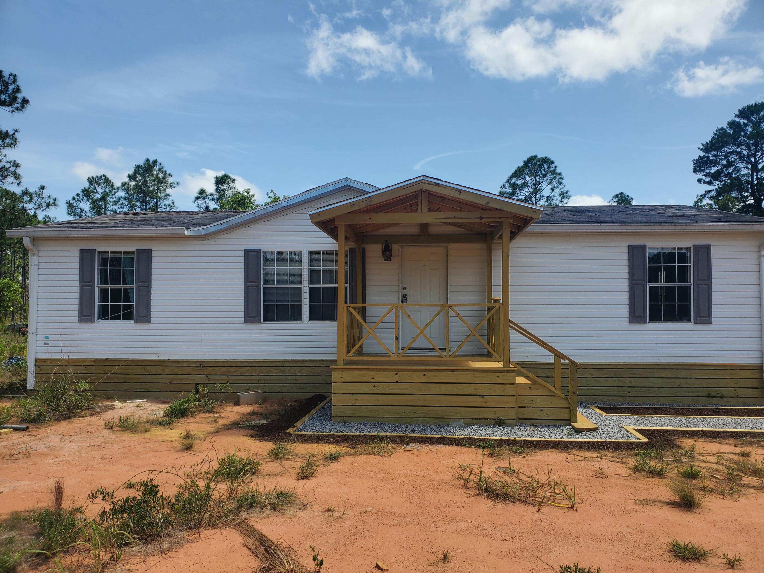 Discover the perfect blend of comfort, space, and serenity with this charming manufactured home set on 3.83 acres of open land. This property offers a peaceful retreat with plenty of room for gardening, outdoor recreation, or future expansion. The home itself features modern amenities, a functional floor plan, and inviting living spaces designed for relaxation. Whether you're looking for a private getaway or a place to start a small homestead, this beautiful acreage provides endless possibilities. Conveniently located yet tucked away for privacy and tranquility, this is an opportunity you won't want to miss!'