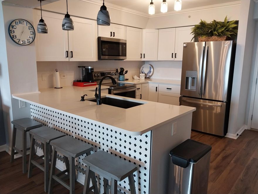 The decorator did a fabulous job! Updates  to Kitchen w/gorgeous quartz countertops, new  white shaker cabinets, bathrooms with new tub showers, tile & vanities. New paint, crown molding, LVP floors, furniture & accessories. New hardware on doors, and both closets have some very nice storage features. This unit was a long term rental but it would make a great short term rental property.  I will supply projections when I get them. Easy access as owner is keeping open to sell. Unit truly is turnkey & ready to rent. There is nothing left for a buyer to do. It is one of the best remodels I have seen in the Terrace. We have a cross easement with Pelican Beach Resort and can use all amenities they have as well. Tennis, cafe, tiki bar, beach, game room, Gym.