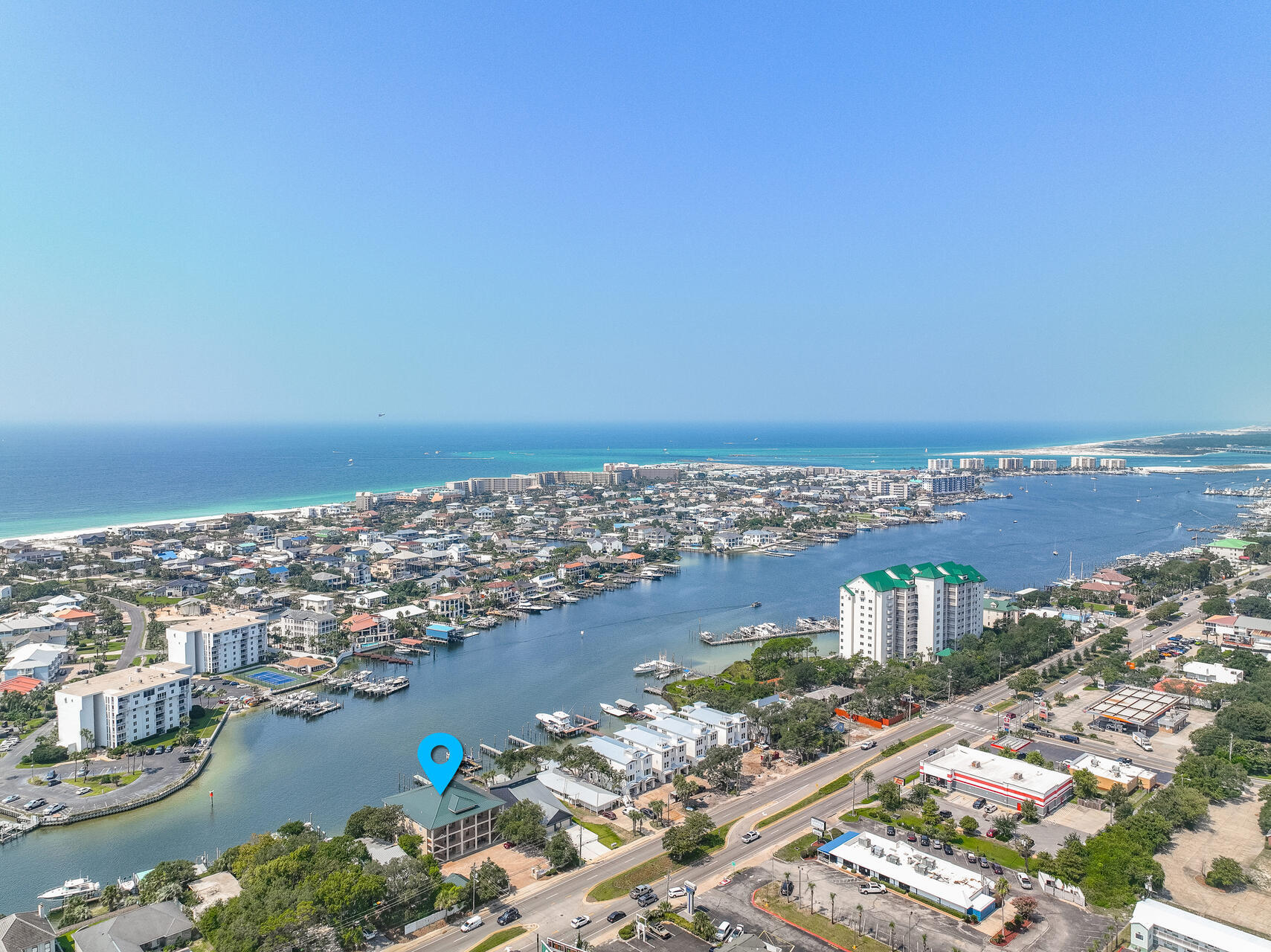 Luxury Waterfront Condo with a Boat Slip on the Destin Harbor. Welcome to Harbor Plantation, an exclusive condominium community offering the best of luxury living with just 6 private units. Situated on the picturesque Destin Harbor, this 3 bedroom/ 3 bath residence offers the perfect blend of elegance and tranquility.Unwind by the brand new pool and patio, the perfect spot for socializing with friends and neighbors. For boating enthusiasts, one of the 6 private boat slips awaits, giving you direct access to the harbor's sparkling waters.Inside, the open floor plan is bathed in natural light, thanks to expansive glass sliding doors that open to a balcony stretching across both the living room and the