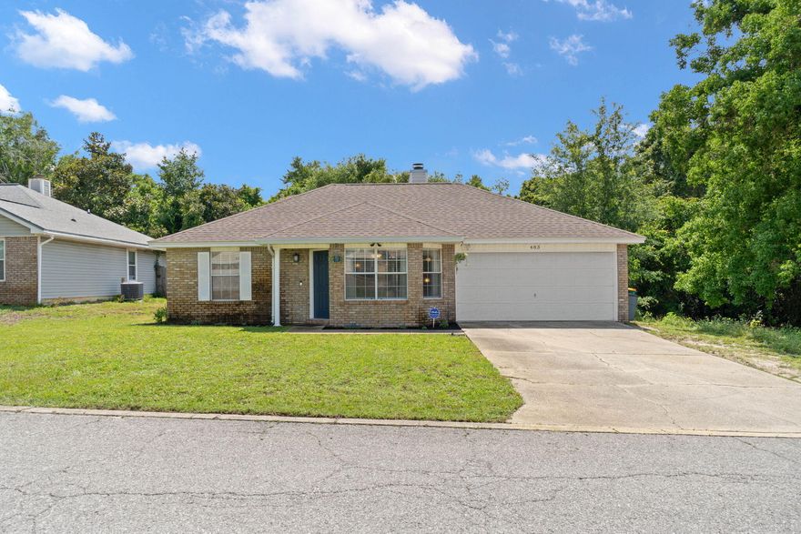 Renovated beauty!! *Have peace of mind with a 2024 water heater, 2020 roof, 2019 HVAC* Enjoy less than a 10 minute drive to Hurlburt Field in this updated 3 bedroom, 2 bath, 2 car garage home. Enter inside and enjoy the luxury vinyl plank flooring that extends all throughout the house (no carpet!) as well as extras like crown molding in the living room and the charming wood burning fireplace adorning the room. The dining space leads to the beautiful kitchen that features updated kitchen cabinets, granite countertops complete with a breakfast bar, stainless appliances, a single basin sink and updated faucet, and finished off with new hardware. The master bedroom features an en suite bath with double vanities, a tub/shower combo and a walk in closet. The other two bedrooms have ample closet space and share another full bath. Outside you will love relaxing on your extended deck within the fully fenced in backyard and new sod. There are no neighbors behind you so enjoy the extra privacy and peaceful wooded view! Welcome home!