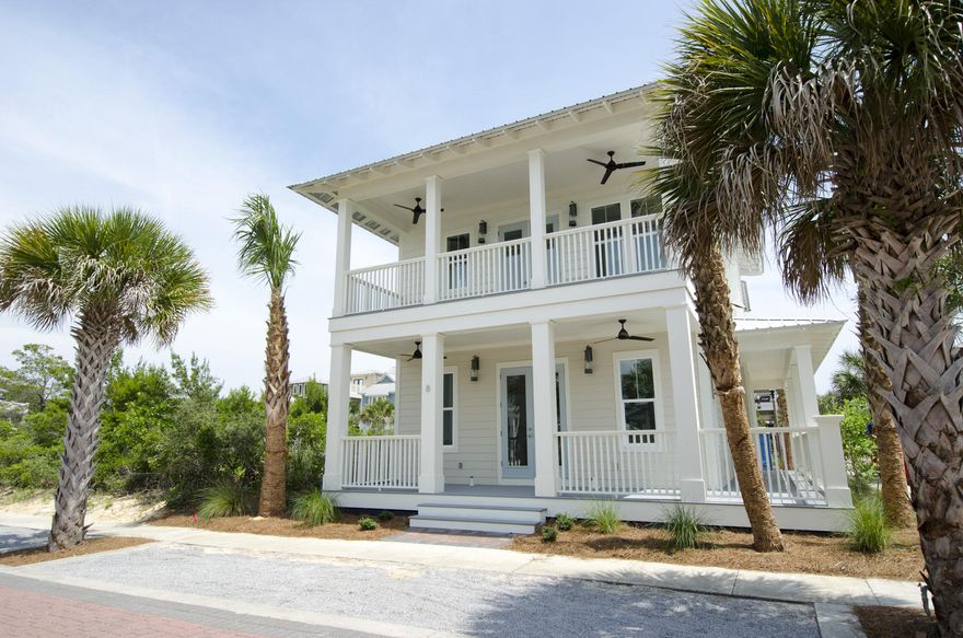 This charming two story cottage with wrap around porch in Seacrest Beach, can be your haven of rest or port of call for fun in the sun anytime of year. Entertaining is a delight with the large open floor plan that combines the living, dining, kitchen and sitting areas. The secluded bedroom at the rear of the first floor is ideal for grand parents or friend that vacation with the family. Ascend the stairs to the second floor which contains a spacious landing, complete with wet bar, which can be used as a study, library or lounge area. the large master suite contains two walk in closets, a master bath with double sinks, a stunning cultured marble free standing tub and separate seamless glass walk in shower. French Doors open onto the spacious second story porch which is ideal for coffee
