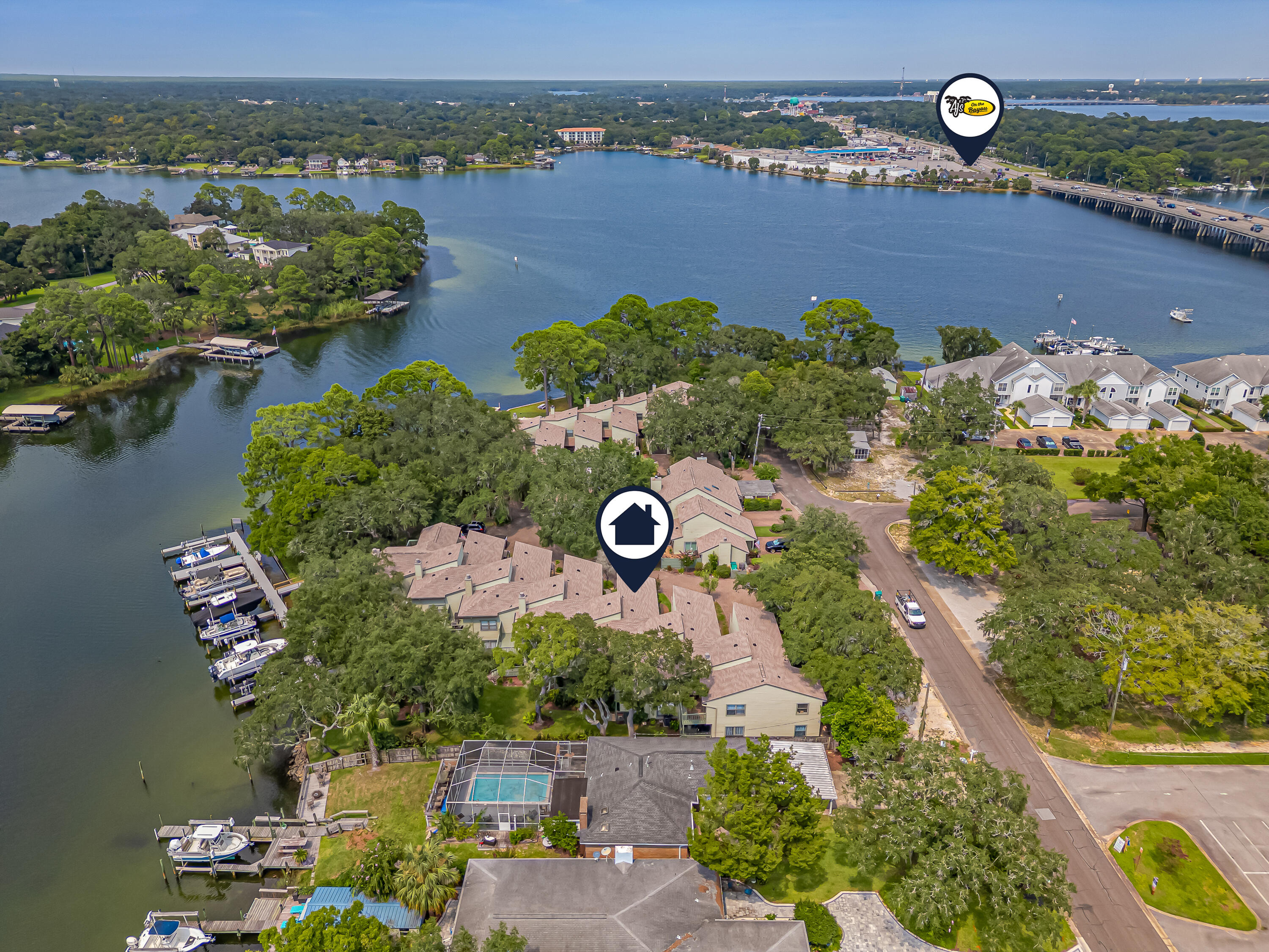 Before you fall in love with your new home, know that this adorable community is only 5.5 miles to Eglin AFB and 7.5 miles to Hurlburt Field. Not to mention, your while sandy beaches are even closer. Nestled quietly along the serene waters of Cinco Bayou, this private community offers the perfect blend of refined living and laid-back coastal charm. At its heart is a beautifully designed townhouse--your gateway to a lifestyle where every day feels like a retreat. With calm bayou waters just steps from your door, paddleboarding, kayaking, or jet skiing become effortless and inviting. Around the neighborhood, residents gather by the community fire pit to share evenings that turn neighbors into lifelong friends. Hammocks and hammock chairs are tucked into shaded nooks, while a private beach area stretches across the shoreline, giving you countless spots to unwind or watch the sky turn gold at sunset. Here, you don't have to choose between elegance and comfort. Whether you're looking for
an active waterfront lifestyle or peaceful moments surrounded by natural beauty, this community offers both tucked away, yet perfectly connected to everything you need.