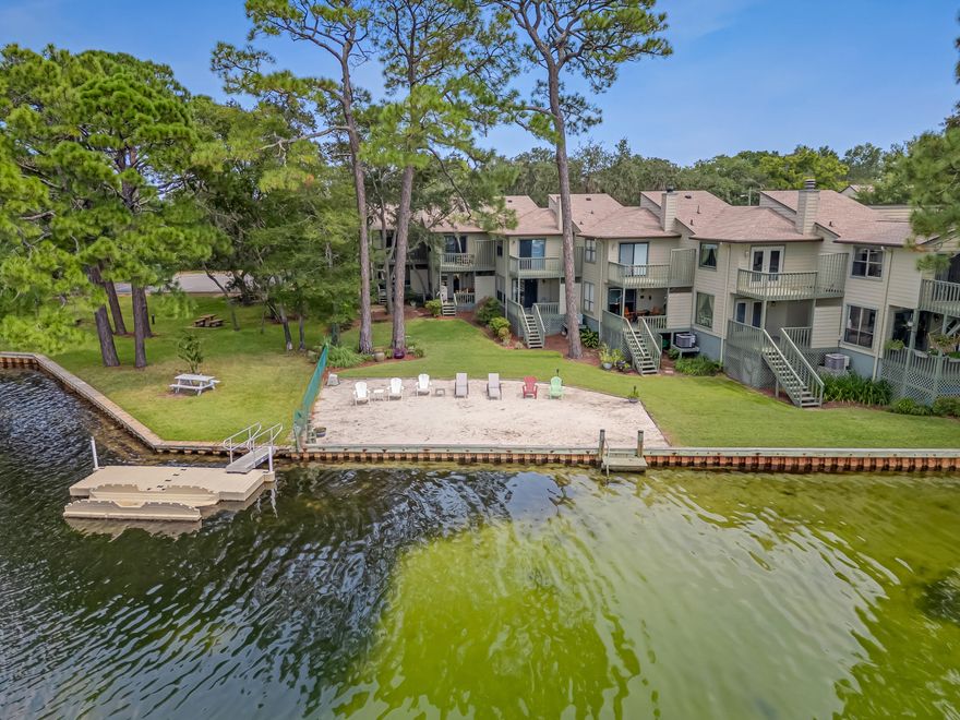 Before you fall in love with your new home, know that this adorable community is only 5.5 miles to Eglin AFB and 7.5 miles to Hurlburt Field. Not to mention, your white sandy beaches are even closer. Nestled quietly along the serene waters of Cinco Bayou, this private community offers the perfect blend of refined living and laid-back coastal charm. At its heart is a beautifully designed townhouse--your gateway to a lifestyle where every day feels like a retreat. With calm bayou waters just steps from your door, paddleboarding, kayaking, or jet skiing become effortless and inviting. Around the neighborhood, residents gather by the community fire pit to share evenings that turn neighbors into lifelong friends. Hammocks and hammock chairs are tucked into shaded nooks, while a private beach area stretches across the shoreline, giving you countless spots to unwind or watch the sky turn gold at sunset.  Here, you don't have to choose between elegance and comfort. Whether you're looking for
an active waterfront lifestyle or peaceful moments surrounded by natural beauty, this community offers both tucked away, yet perfectly connected to everything you need. 