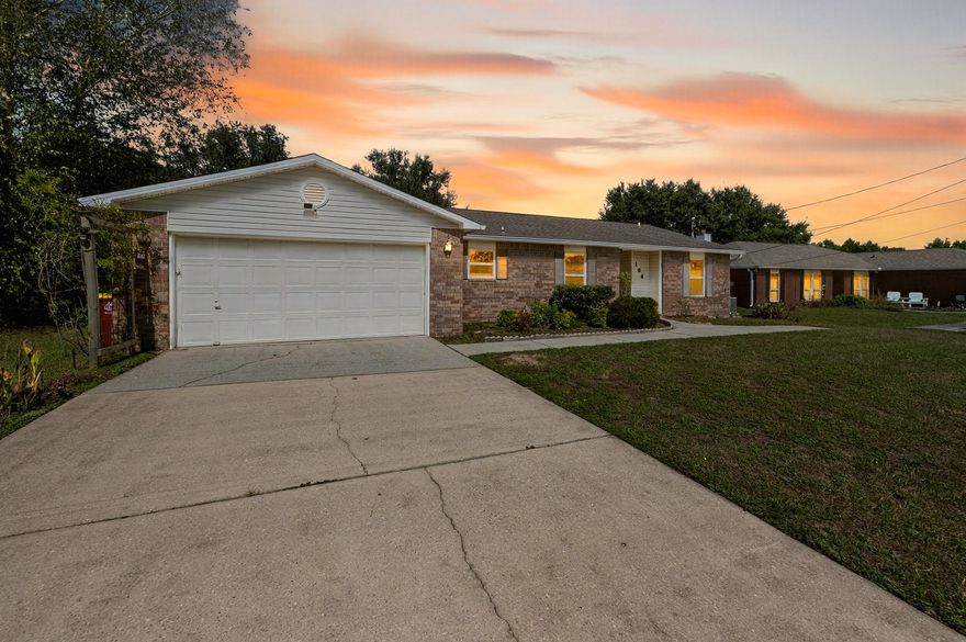 Beautifully refreshed inside and out, this South Crestview home is ready for its next owner! Located on a generous quarter-acre lot with no HOA, this property offers privacy and convenience just minutes from PJ Adams Parkway. Inside, you'll appreciate the all-new flooring, fresh paint, and a brand-new water heater. The kitchen includes quality appliances and a functional layout, while every room feels bright and updated. The roof and all windows were replaced in 2018, providing peace of mind for years to come. The cozy back patio was screened in 2020, perfect for relaxing or entertaining outdoors. The home has been professionally cleaned for a truly move-in-ready experience. The backyard features a lofted shed for extra storage or workspace. Connected to septic, not sewer.