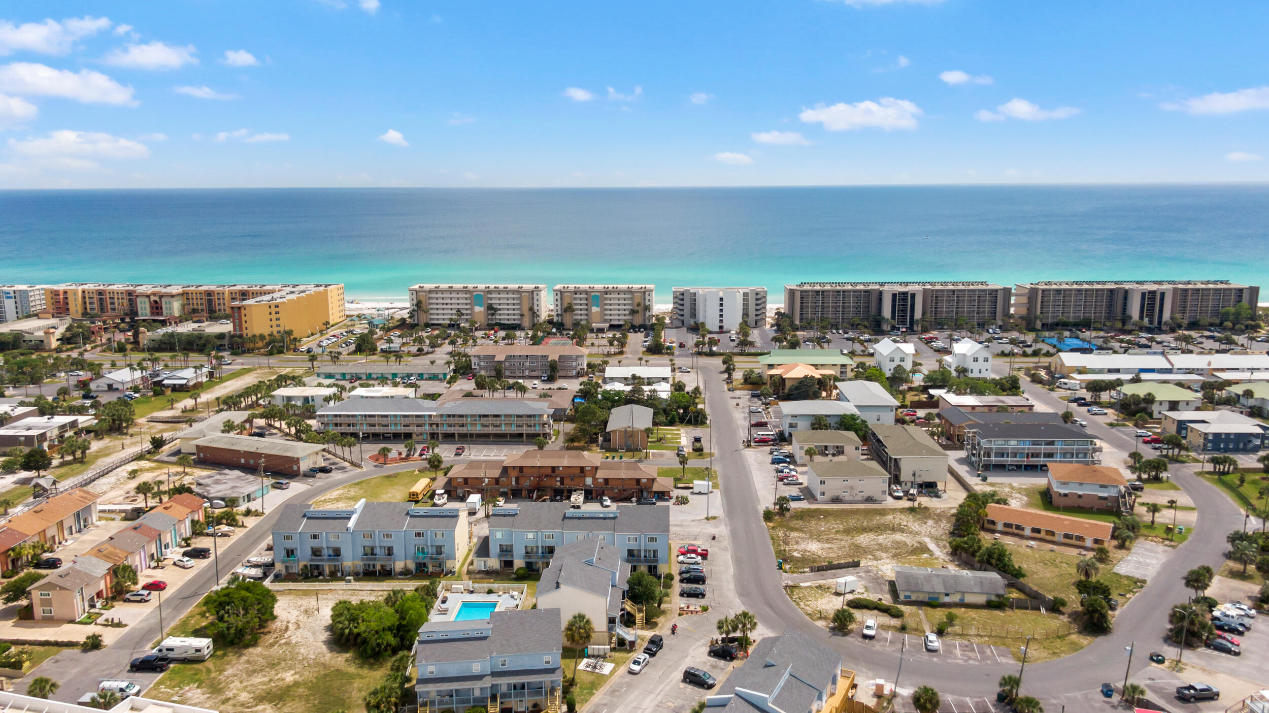 Welcome to this stunning turnkey-ready 2 bedroom/2.5 bathroom condo! Perfectly situated across the street from the beautiful white sandy beaches of the emerald coast, this condo offers the full package for beach lovers and boaters alike. Relax and unwind with a warm living space, newly remodeled kitchen with updated appliances, tile & vinyl flooring throughout, private balcony overlooking the pool, and a nice loft as additional space for kids or a game-room that includes newly updated ac/duct work, and electrical. The HVAC also has a brand new filtration system to provide cleaner air for guests. Take a refreshing dip in the community pool or head over to your very own boat slip for a day out on the water. Enjoy a morning cup of coffee or an evening glass of wine on your private balcony as