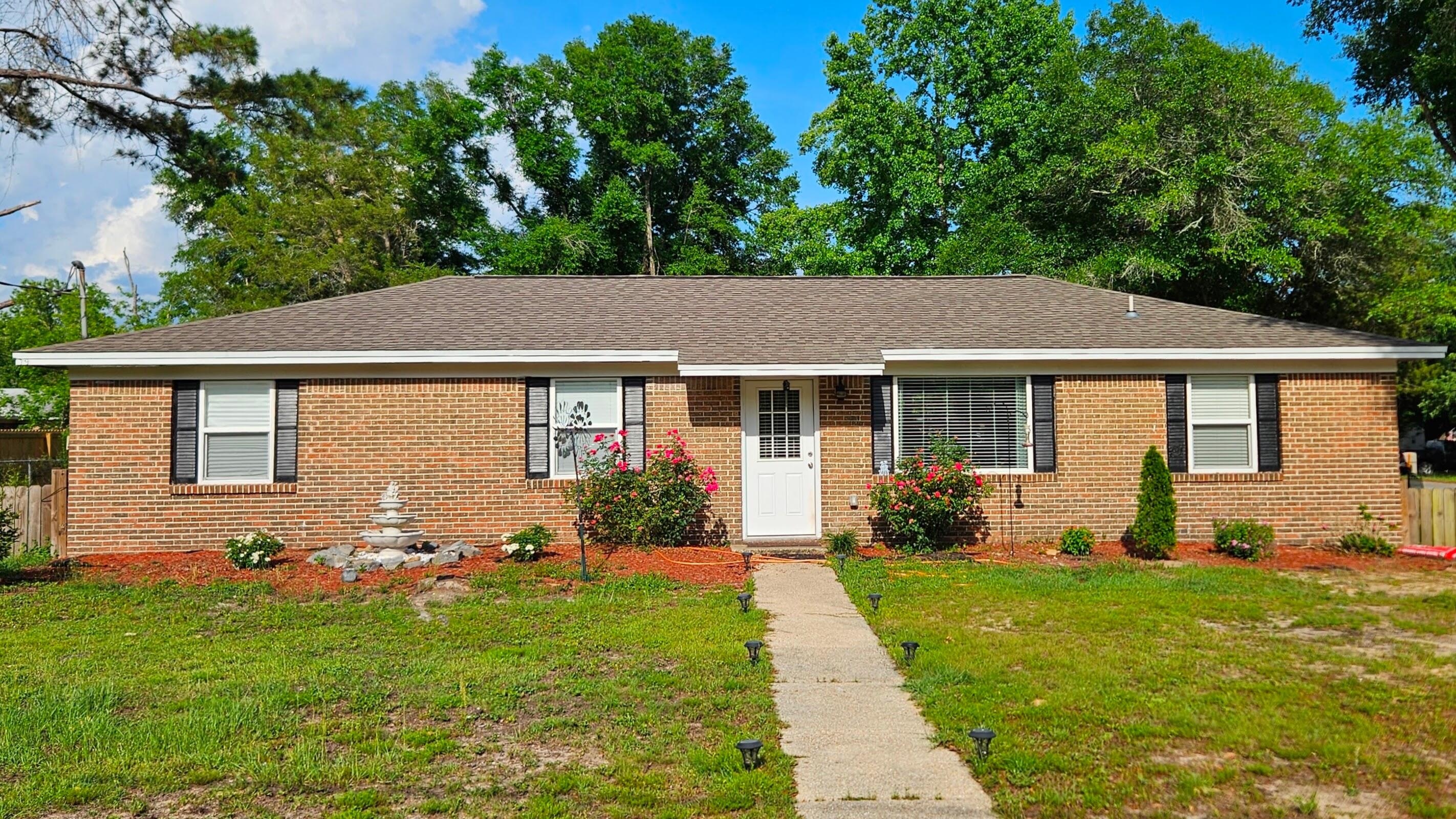 Charming, fully remodeled home. Rebuilt from the studs in 2023, this move-in-ready home boasts new wiring, roof, 3-ton HVAC, water heater, modern flooring, new bathrooms, and a new kitchen. Recessed lighting creates a warm ambiance throughout. Nestled on a spacious A1/2-acre corner lot, perfect for outdoor living, with no HOA restrictions.