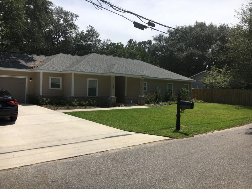 Beautiful & well maintained Craftsman style home built in 2016. Home features 3 bedrooms, 2 baths, & 2 car garage. Gorgeous tile flooring throughout for easy maintenance & carpet in the bedrooms. Open living/dining/kitchen combo perfect for entertaining! Kitchen boasts granite counter tops, stainless appliances, wood cabinets, white subway tile back splash, pantry & breakfast bar. There are even electric/cable outlets for wall-mounted TV's in the living rm & bedrms! The master suite has an exit to the covered patio, 2 walk in closets, dual sinks, water closet, & lg tiled shower! Garage has attic storage w/pull down stairs, an auto opener, & water shut off system. Lg well-manicured/fully fenced backyard great for cookouts, sprinkler system/lawn pump, indoor laundry, & more. Won't last long!