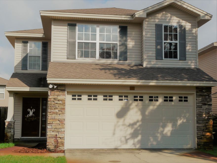 Truly a GORGEOUS HOME in a convenient LOCATION! Great Schools and close to shopping! Come view the special features that this PRISTINE home has awaiting you. Open floor plan with upgrades! Great Master Bed and Bath with double vanities and huge Walk-In Closet! Extra living space with Loft/DEN or ''Sitting Room''. This makes for a calm and serene area of the home. The Living Room, Dining Room and Kitchen area are all open to each other and are GREAT for entertaining. Note the large black Kitchen sink-gorgeous! Lots of GRANITE counter space and gorgeous cabinets that look brand new! Stainless Steel Refrigerator and other appliances stay with home.Sodded lawn and back patio completes the home for your enjoyment. 1 year home warranty. You're going to love this one!